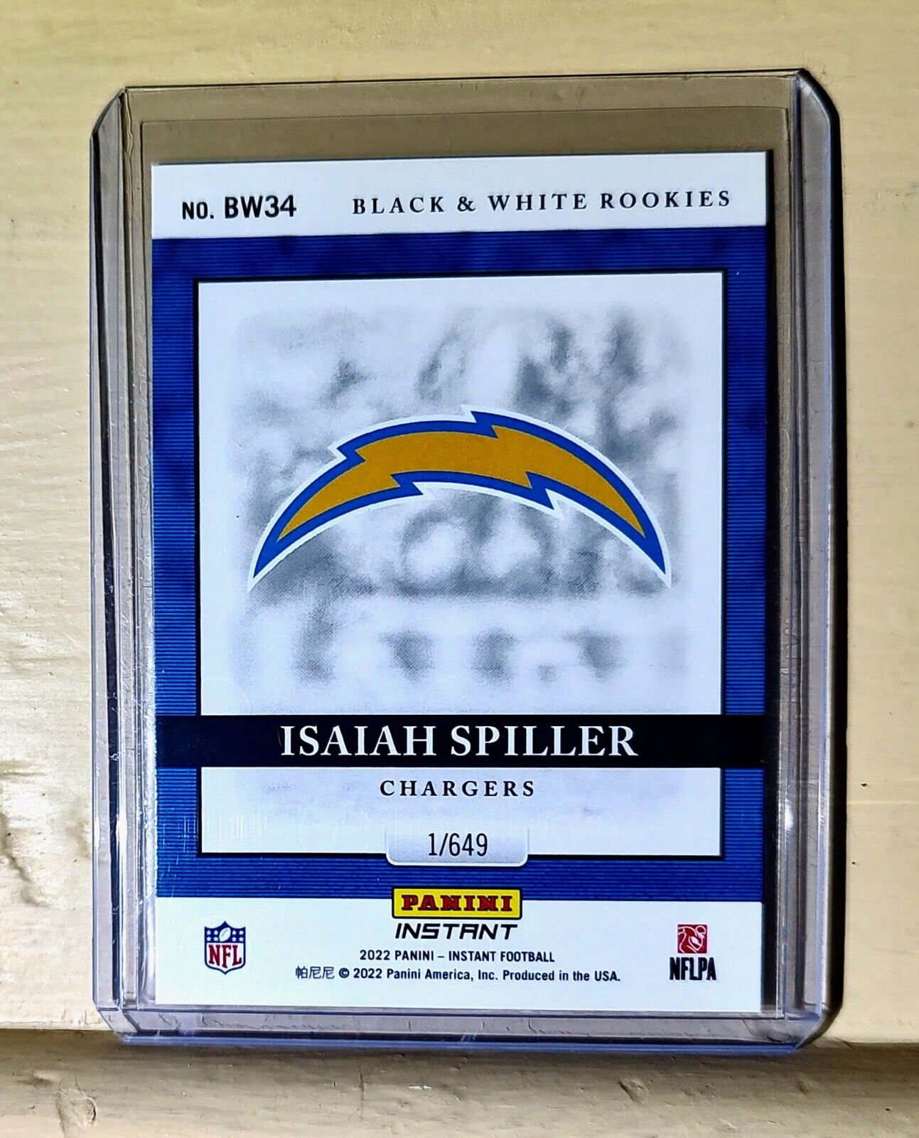 Isaiah Spiller 2022 Panini NFL Black & White Rookies #34 Football Card 1 of 649