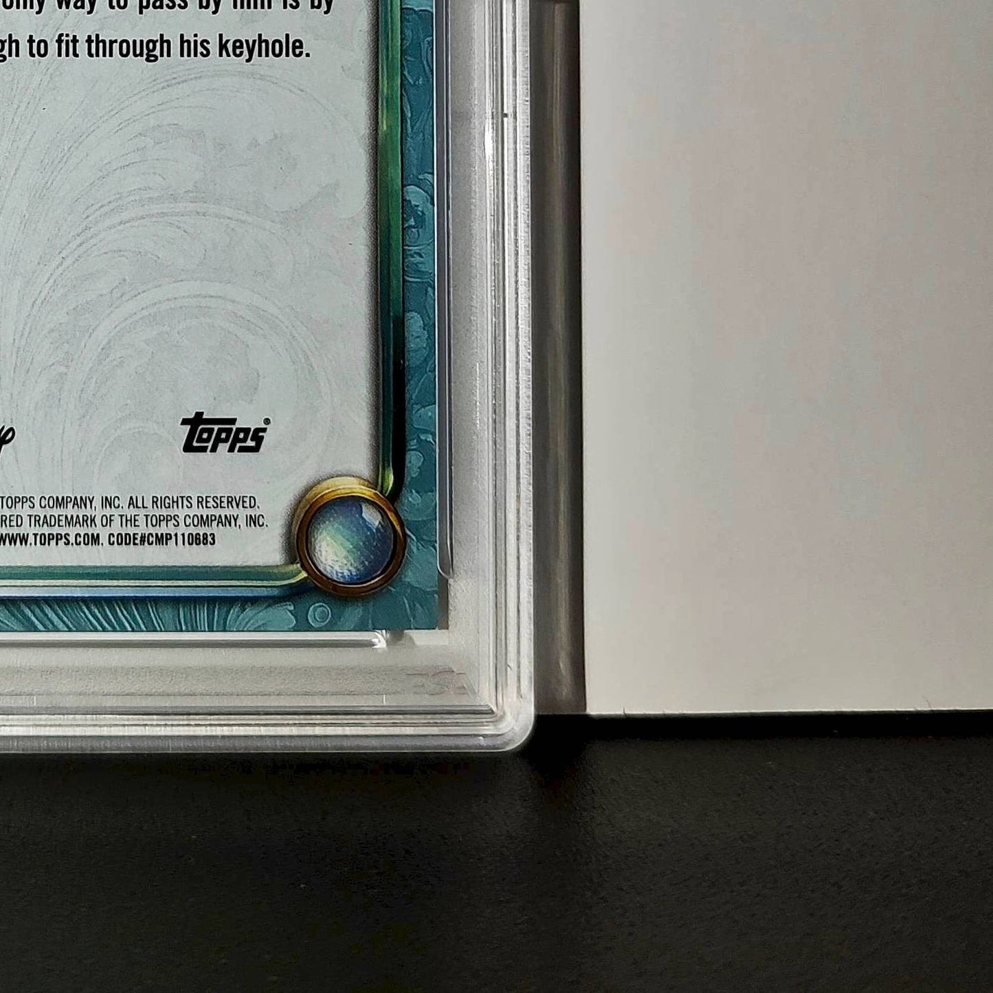 The Doorknob 2025 Topps Disney #117 Diamond Card Alice in Wonderland PSA 9