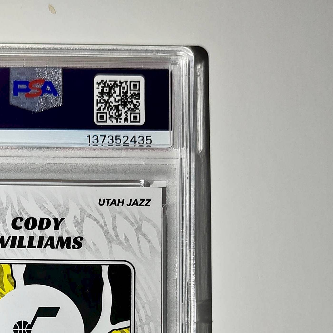Cody Williams Rookie 2024-25 Panini NBA #99 Sticker 4/50 Orange Foil PSA 7 NM