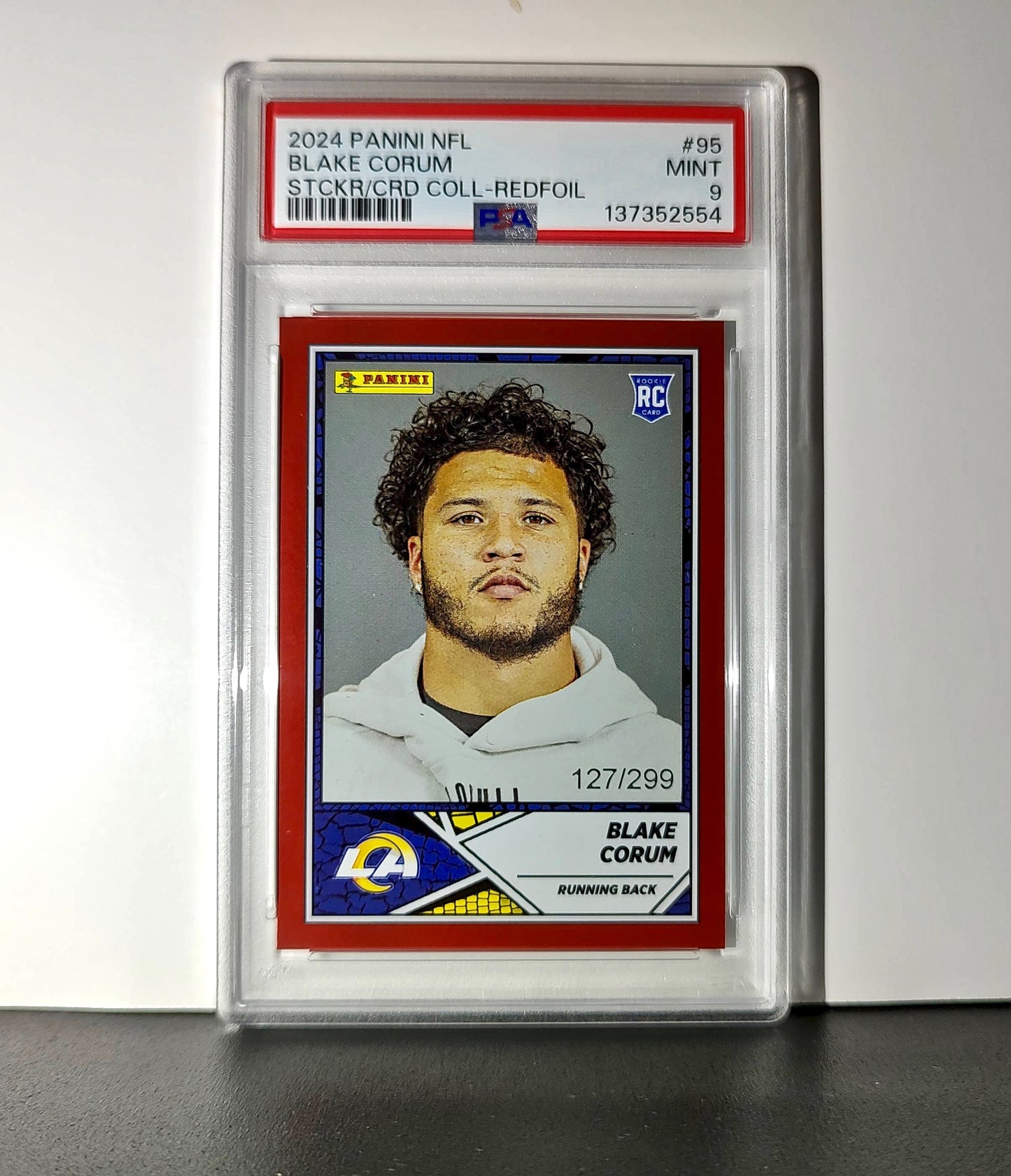 Blake Corum 2024 Panini Sticker Collection 127/299 #95 Red Foil PSA 10 Gem Mint