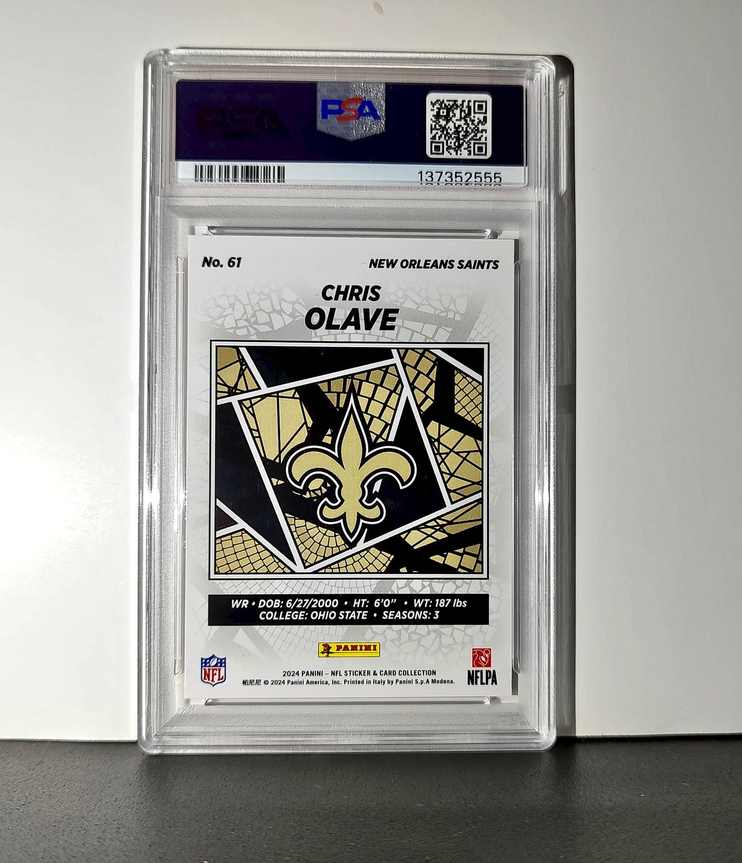 Chris Olave 2024 Panini Sticker Collection 110/299 #61 Red Foil PSA 9 Mint