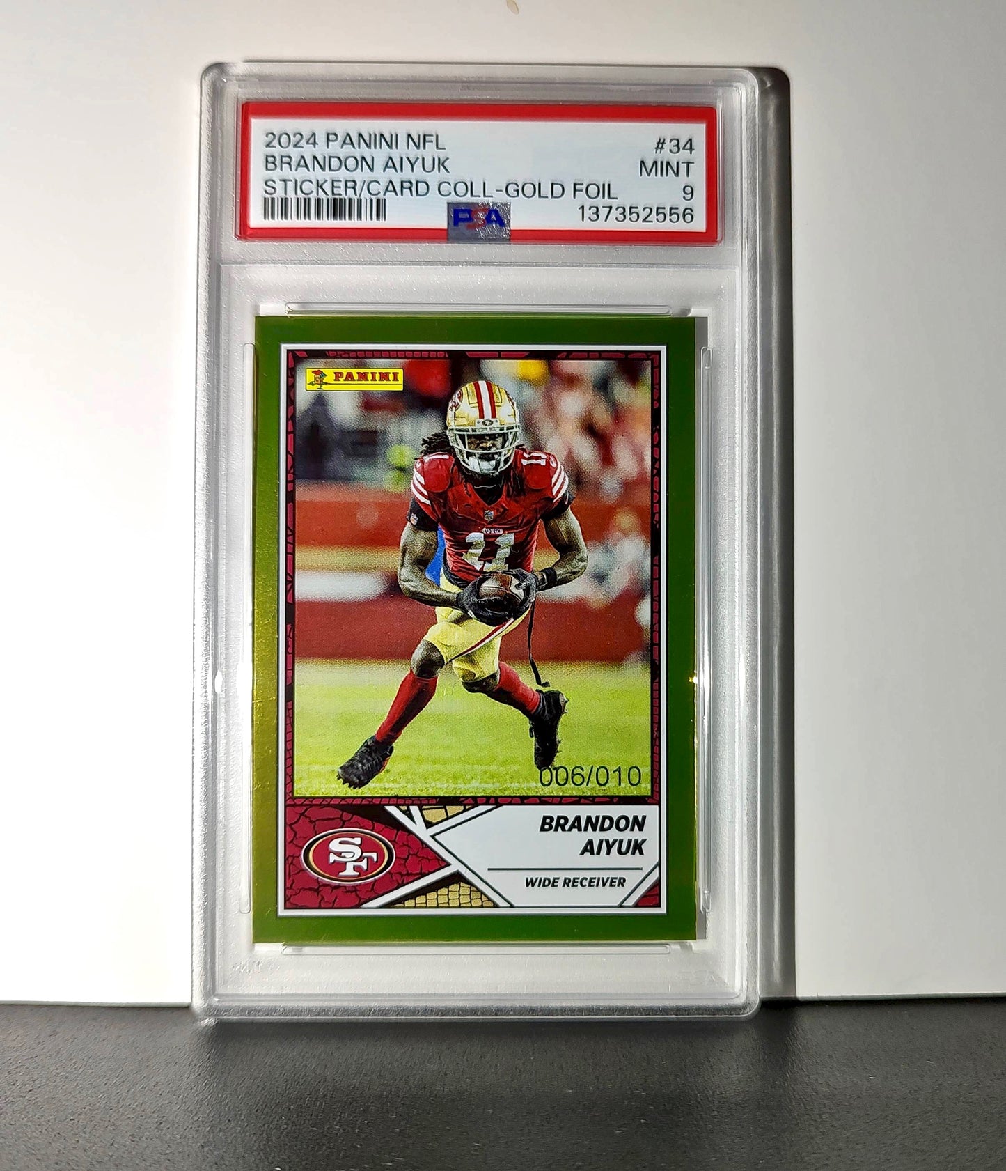 Brandon Aiyuk 2024 Panini Sticker Collection 006/010 #34 Gold Foil PSA 9 Mint
