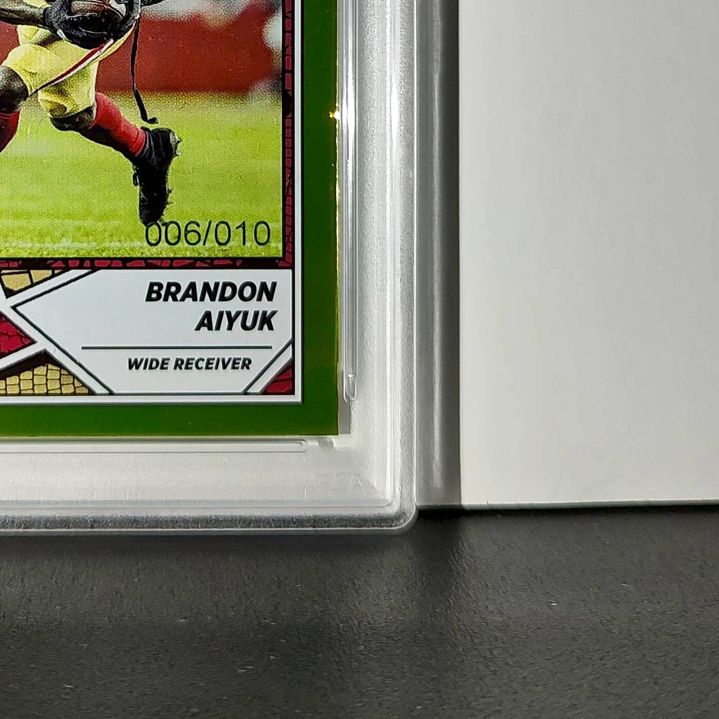 Brandon Aiyuk 2024 Panini Sticker Collection 006/010 #34 Gold Foil PSA 9 Mint