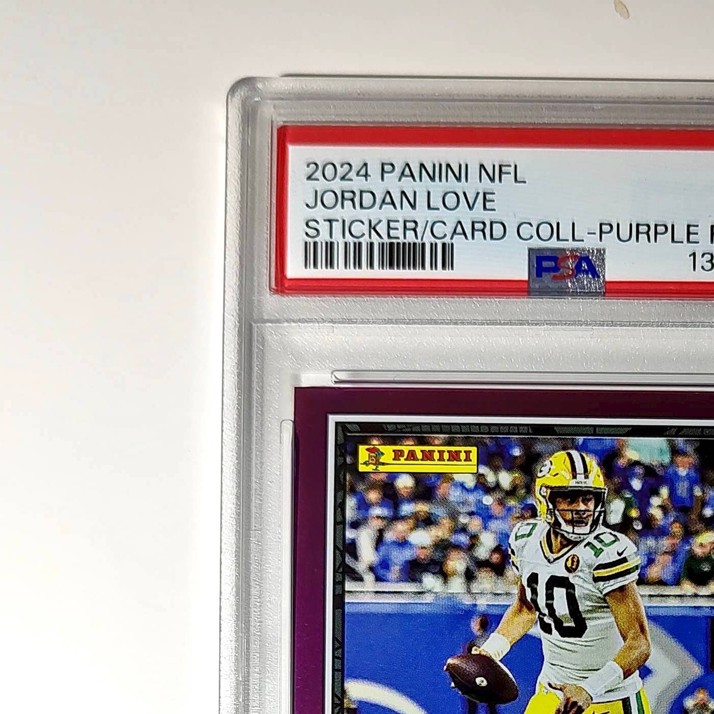 Jordan Love 2024 Panini Sticker Collection 024/099 #18 Purple Foil PSA 8 NM-MT