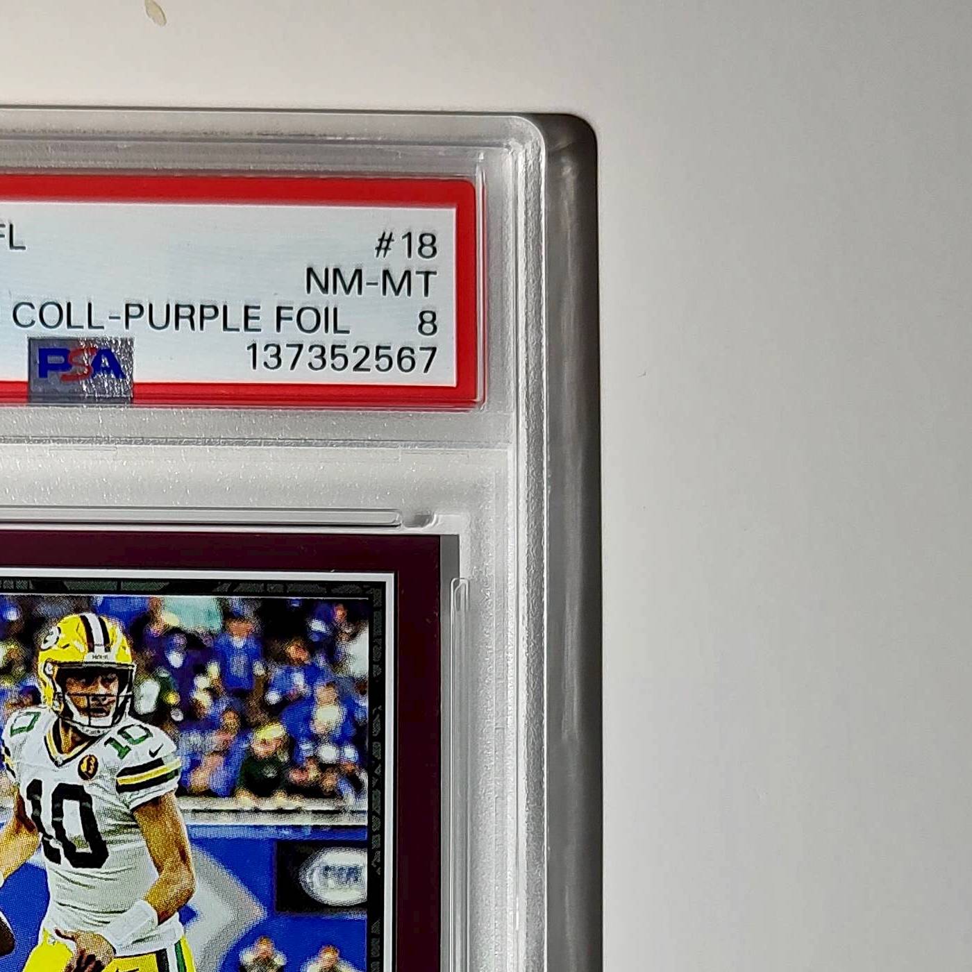 Jordan Love 2024 Panini Sticker Collection 024/099 #18 Purple Foil PSA 8 NM-MT