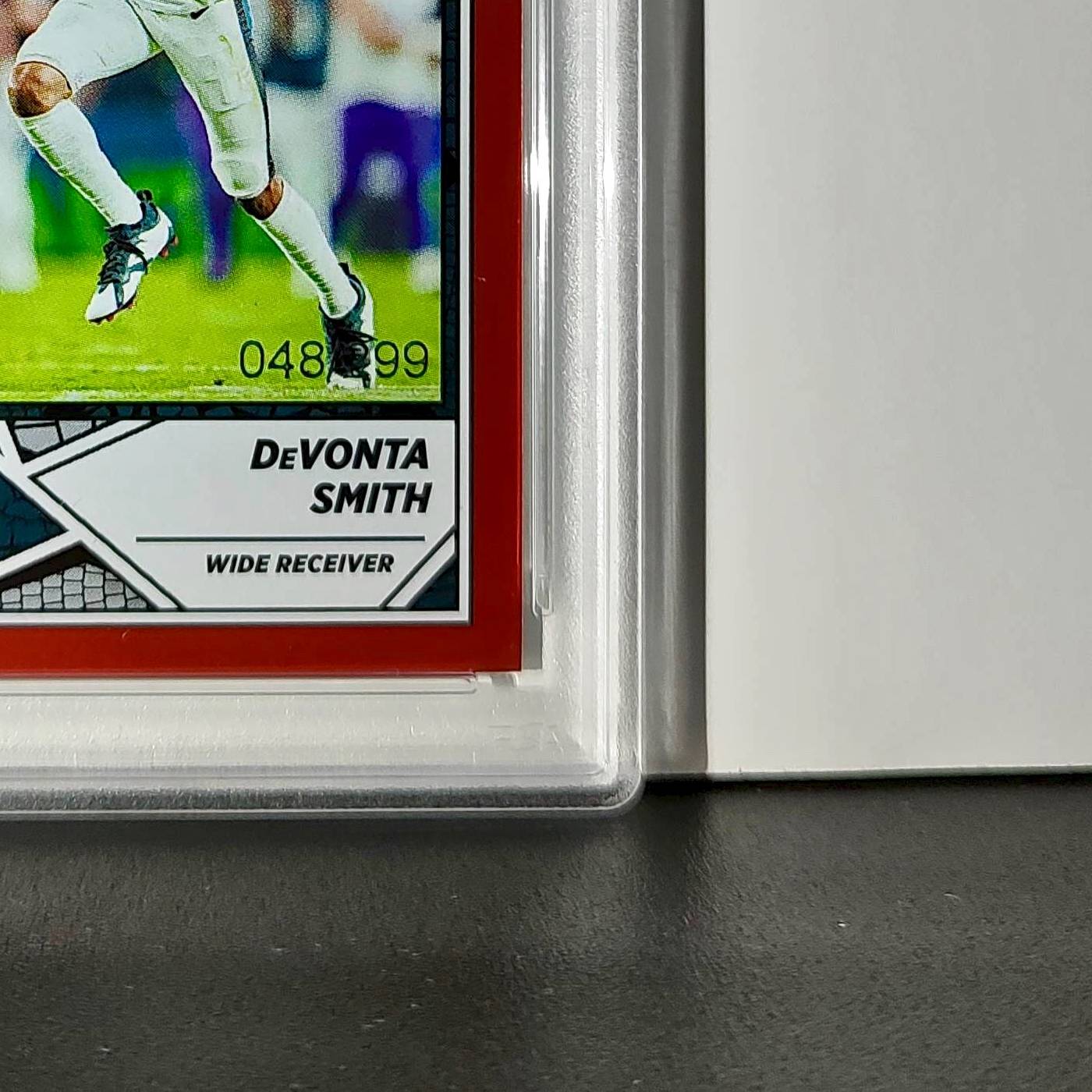 DeVonta Smith 2024 Panini Sticker Collection 048/299 #44 Red Foil PSA 9 Mint