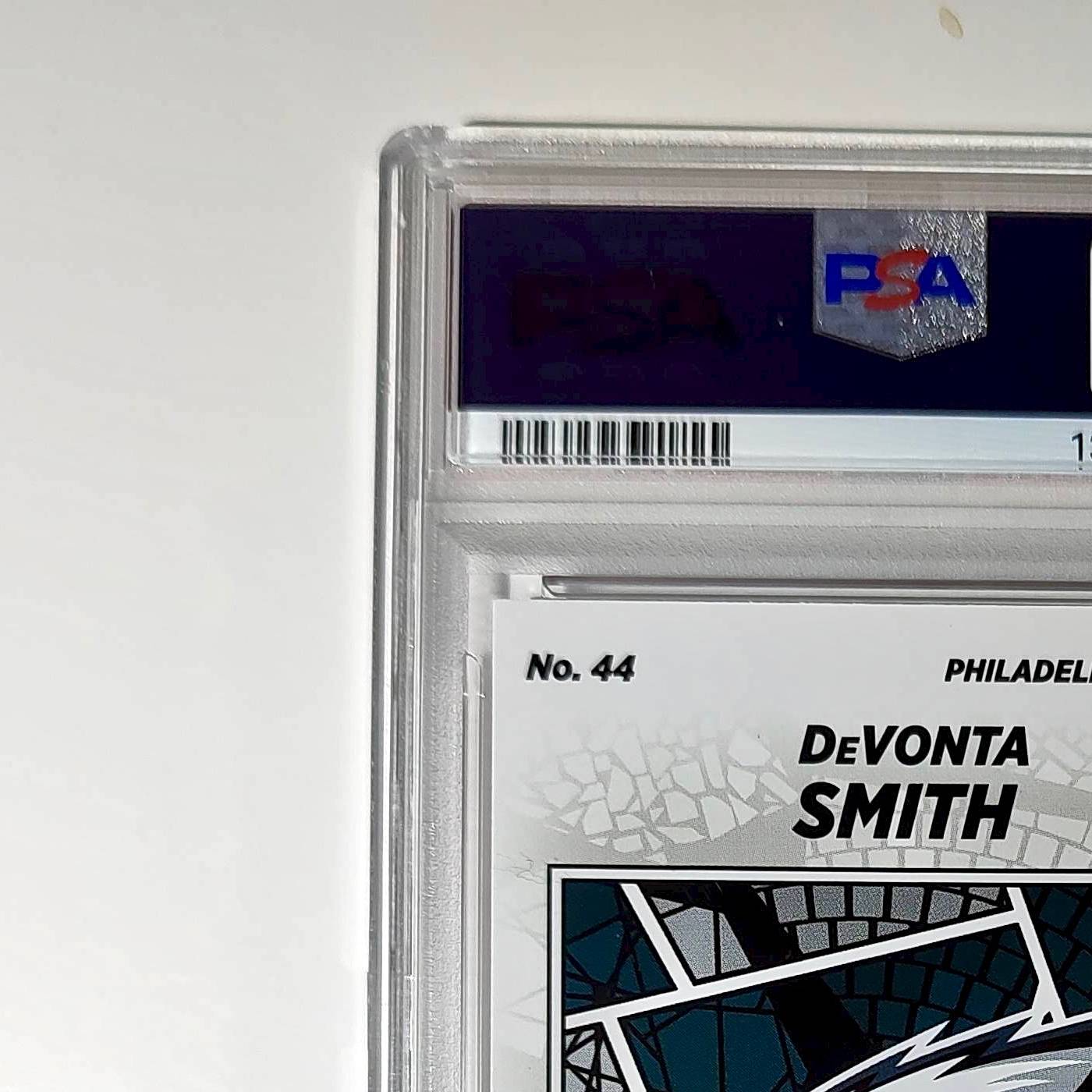 DeVonta Smith 2024 Panini Sticker Collection 048/299 #44 Red Foil PSA 9 Mint