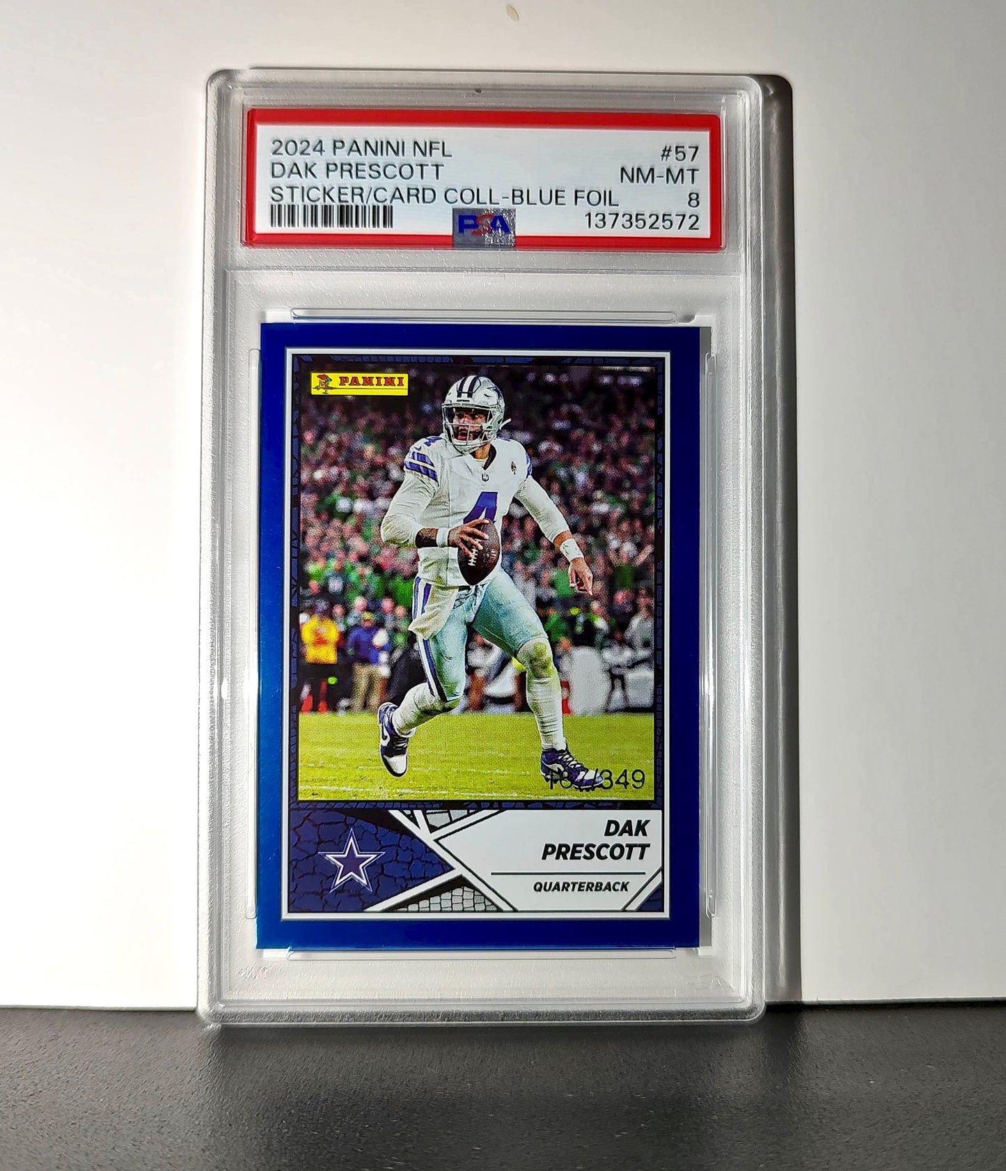 Dak Prescott 2024 Panini Sticker Collection 167/349 #57 Blue Foil PSA 8 NM-MT