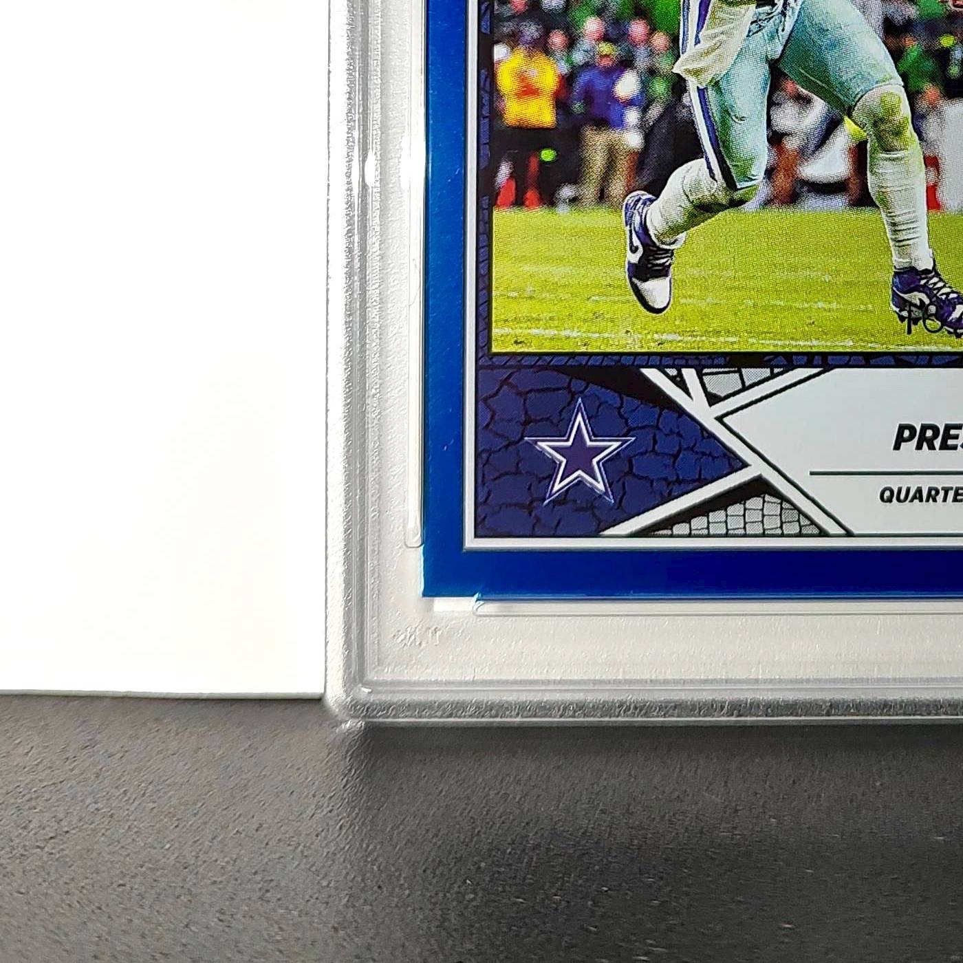 Dak Prescott 2024 Panini Sticker Collection 167/349 #57 Blue Foil PSA 8 NM-MT