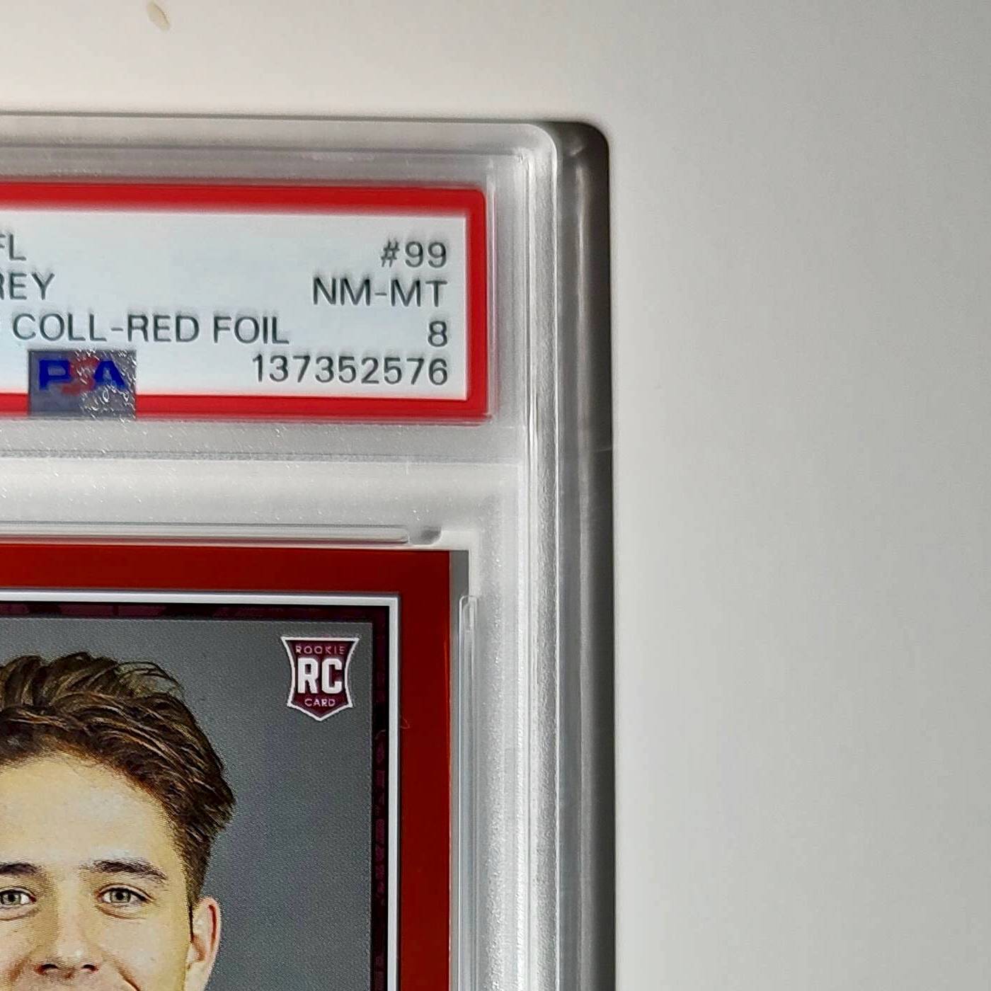 Luke McCaffrey 2024 Panini Sticker Collection 239/299 #99 Rookie Red Foil PSA 8