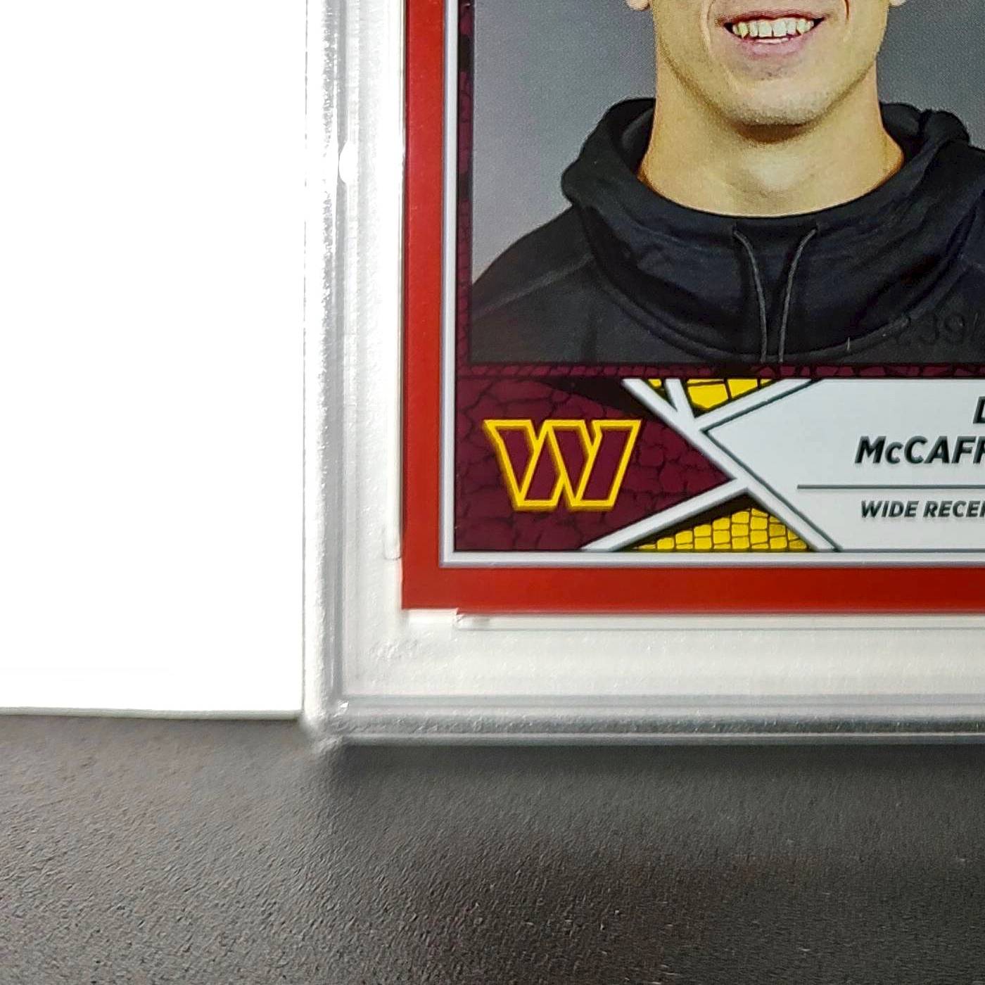 Luke McCaffrey 2024 Panini Sticker Collection 239/299 #99 Rookie Red Foil PSA 8