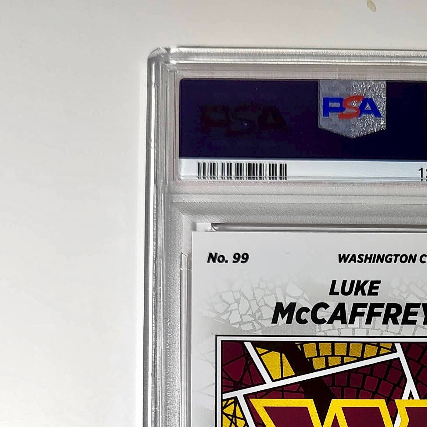 Luke McCaffrey 2024 Panini Sticker Collection 239/299 #99 Rookie Red Foil PSA 8