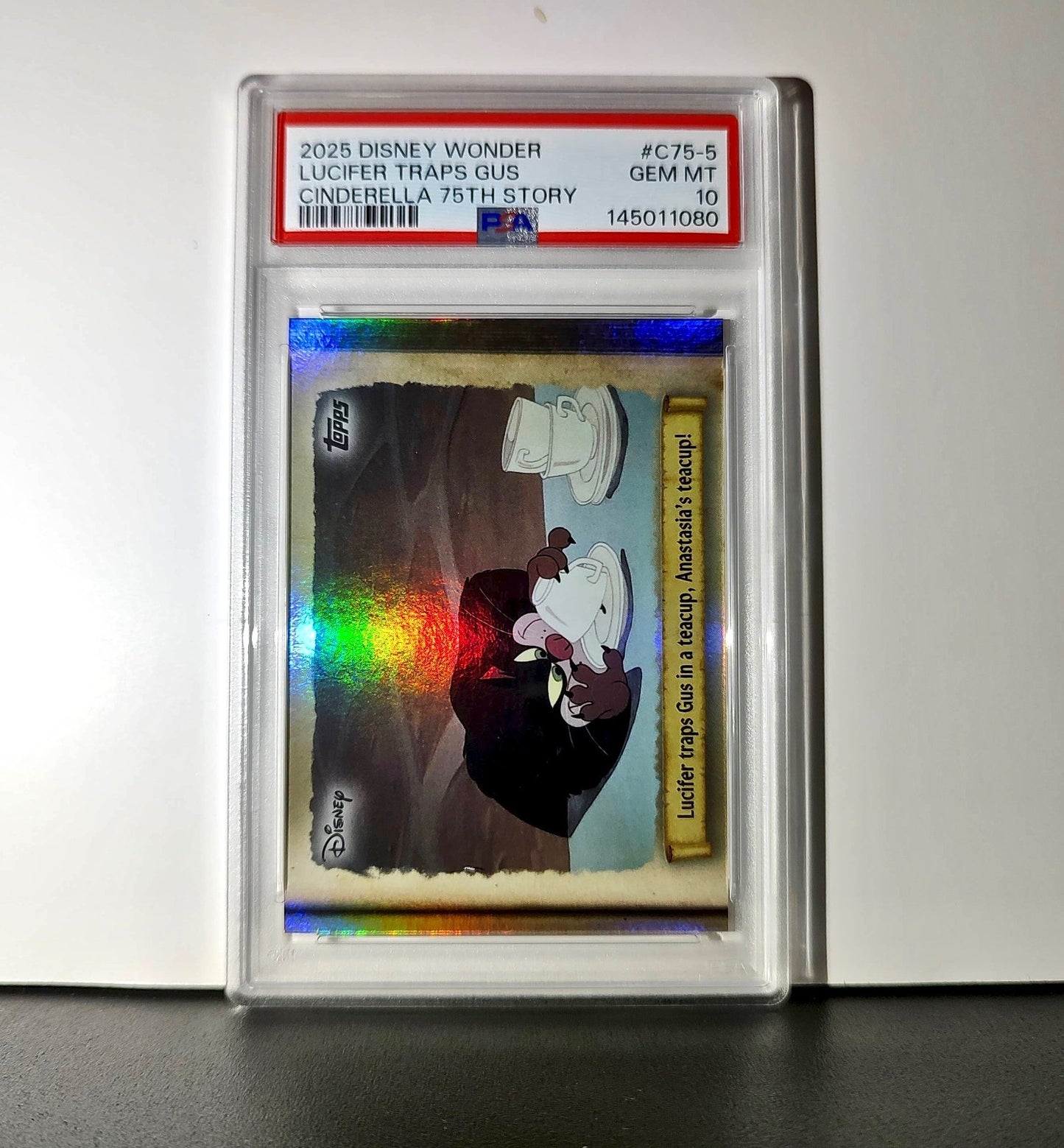 Lucifer traps Gus in a teacup! 2025 Topps Disney #C75-5 PSA 10