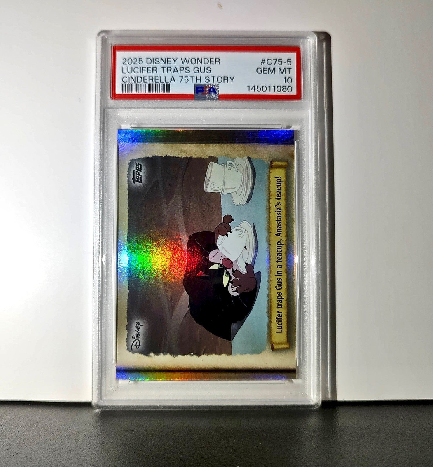 Lucifer traps Gus in a teacup! 2025 Topps Disney #C75-5 PSA 10