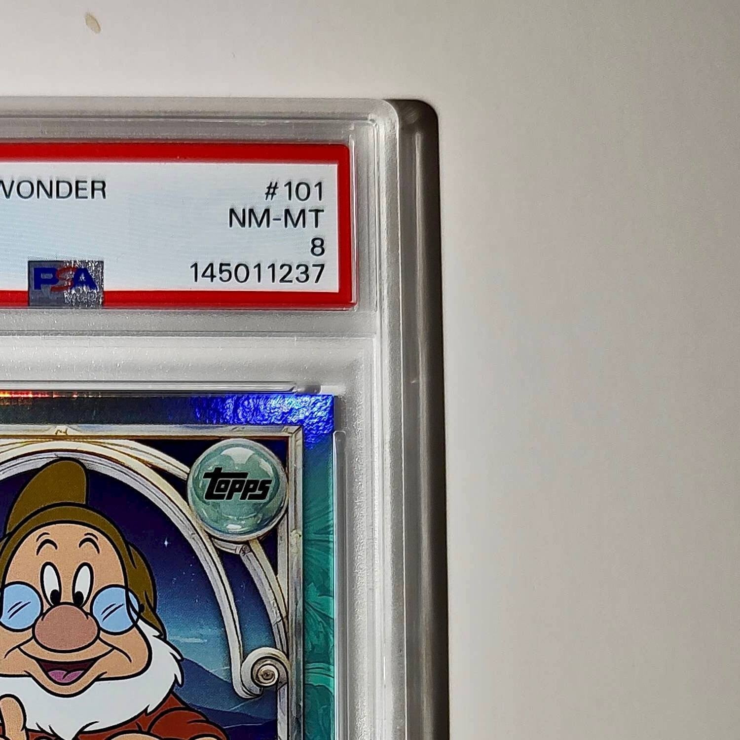 Doc 2025 Topps Disney #101 Diamond Card Snow White and the Seven Dwarfs PSA 8