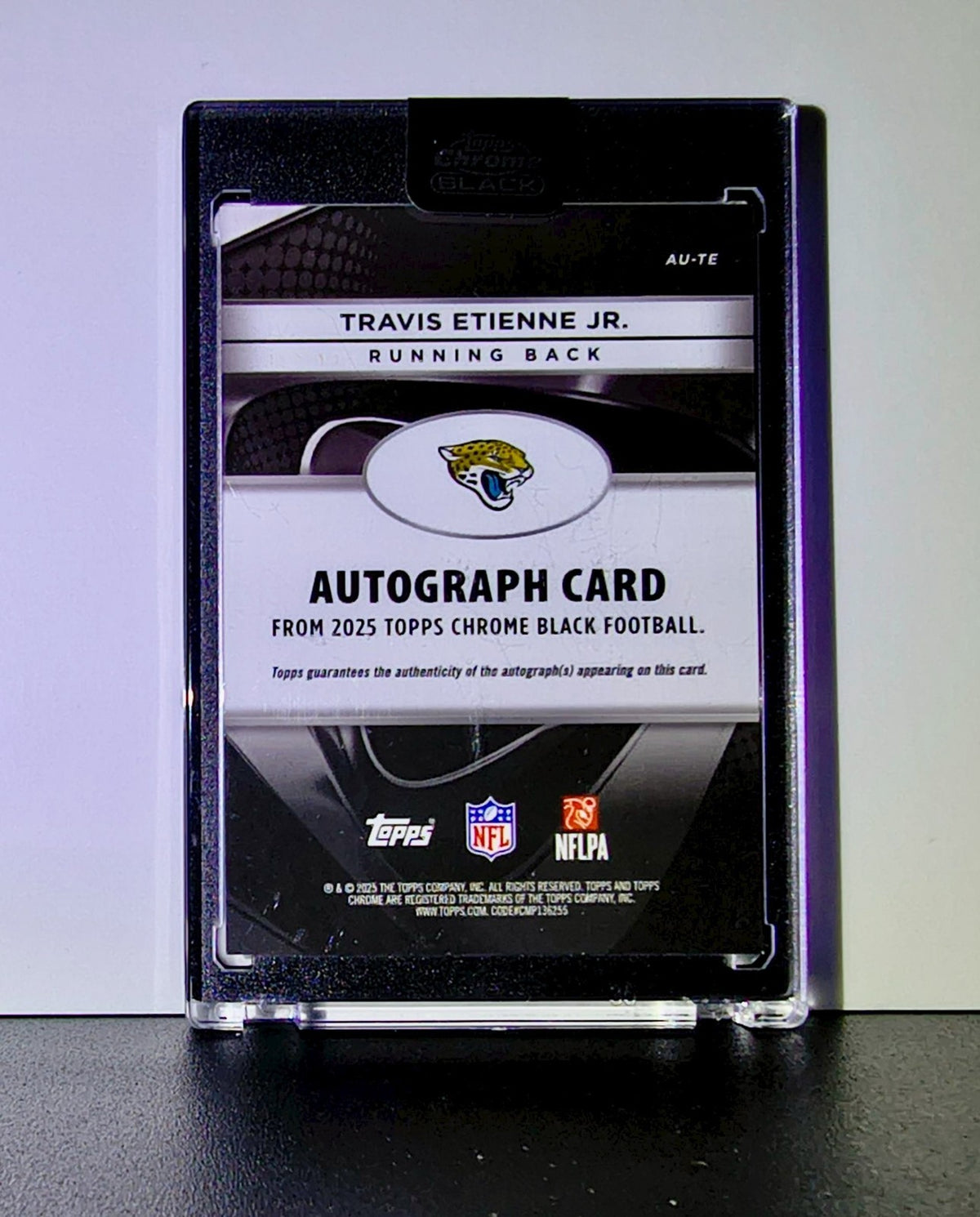 Travis Etienne Jr. 2025 NFL Topps Chrome Black #AU-TE Purple Refractor 58/75
