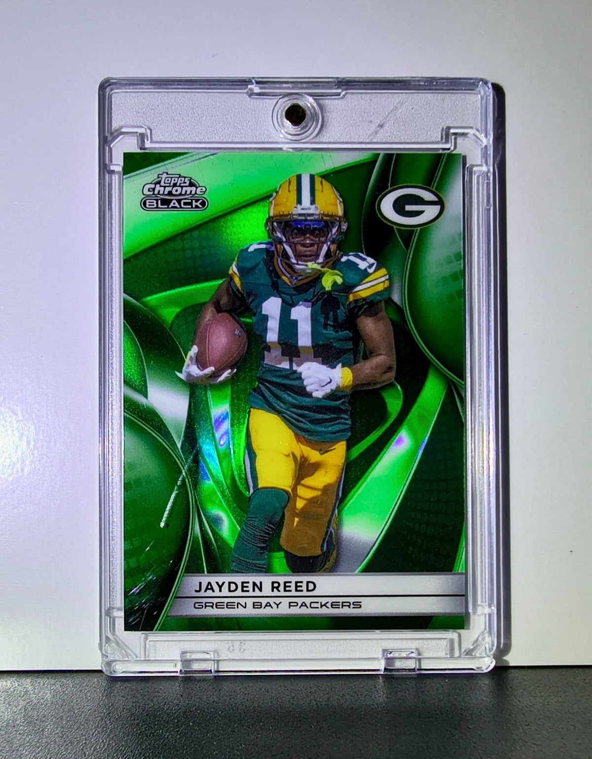 Jayden Reed 2025 NFL Topps Chrome #41 Black Green Refractor Card Packers 29/99