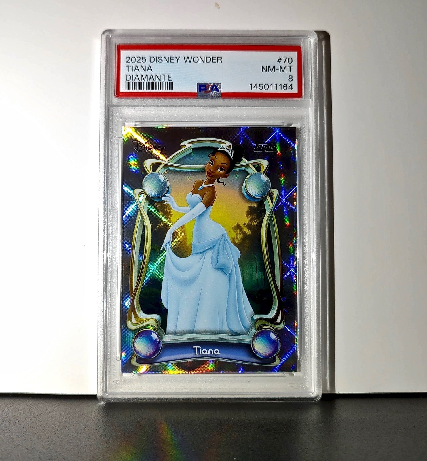 Tiana 2025 Topps Disney #70 Winter Variant Card The Princess and the Frog PSA 8