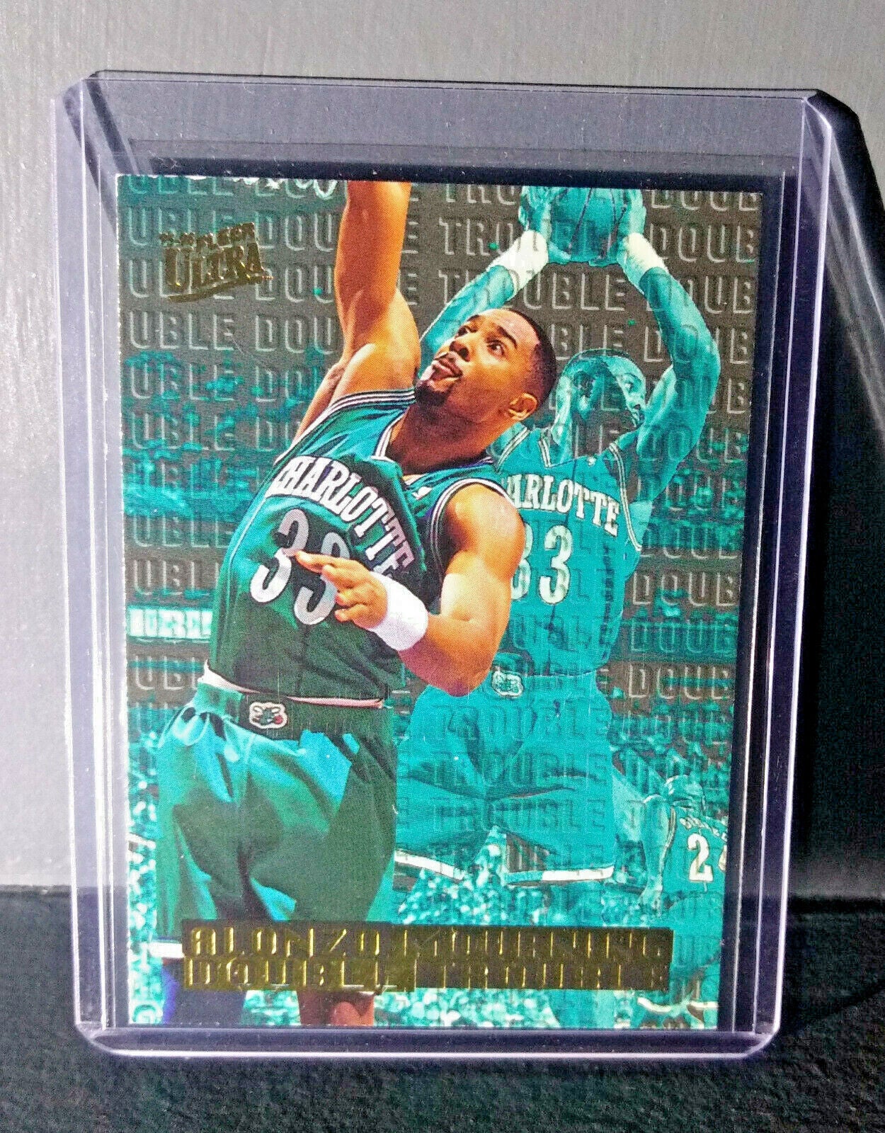 1995-96 Alonzo Mourning Fleer Ultra Double Trouble #4 Basketball Card