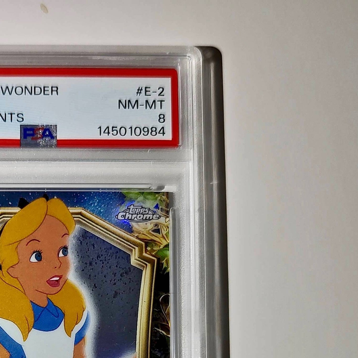 Alice 2025 Topps Enchantments Disney Wonder #E-2 Card Alice in Wonderland PSA 8