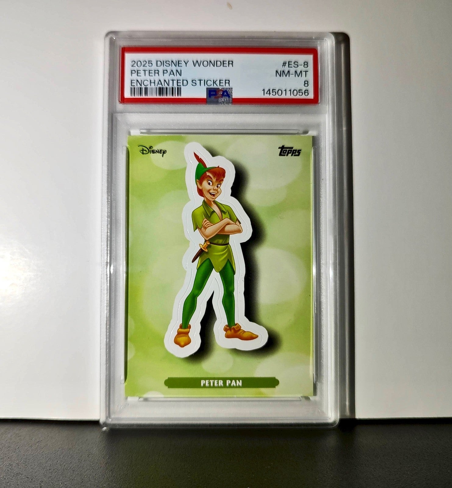 Peter Pan 2025 Topps Disney #ES-8 Enchanted Sticker Card Peter Pan PSA 8