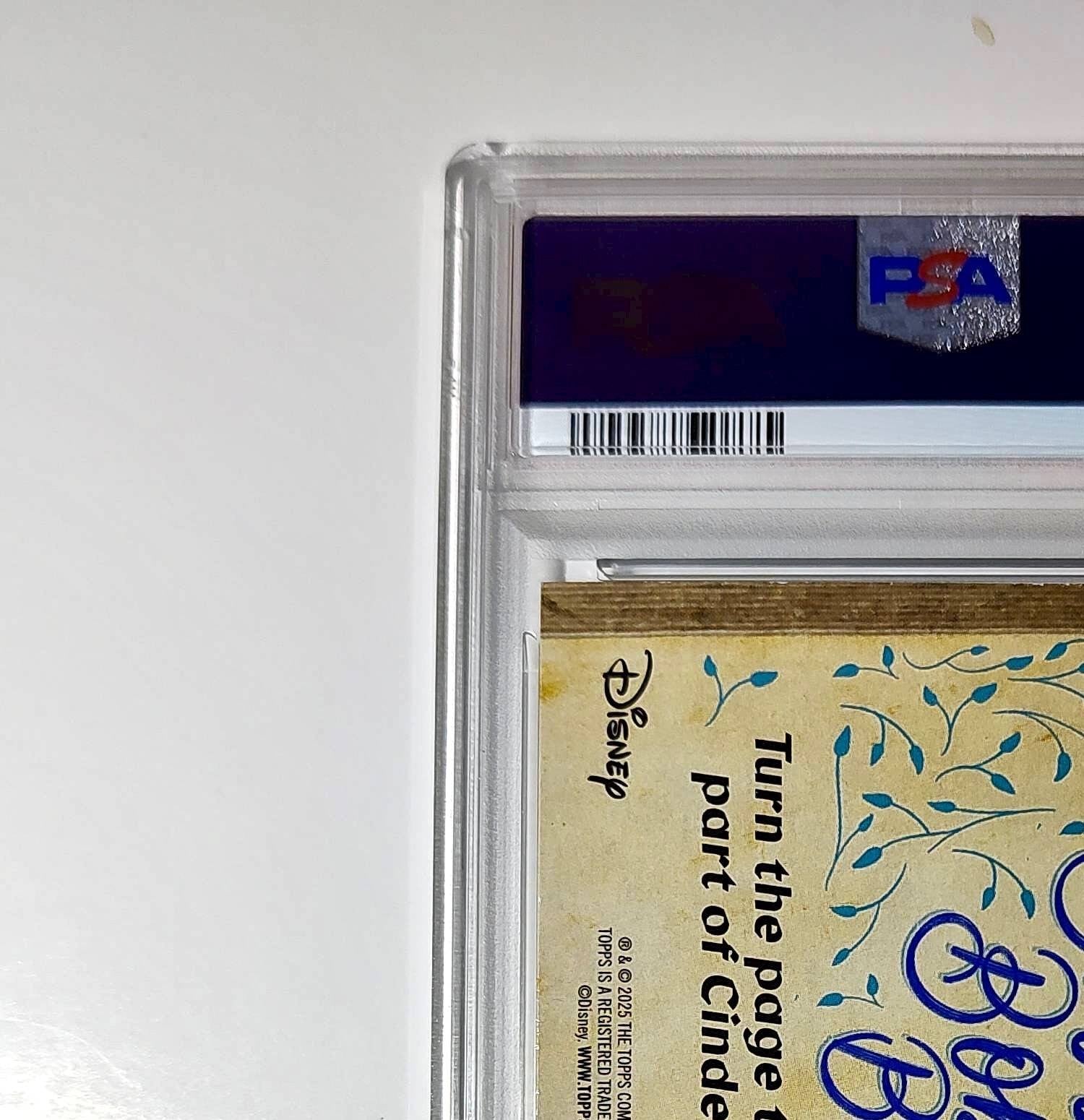 The magic words make a new dress! 2025 Topps Disney #C75-13 PSA 9