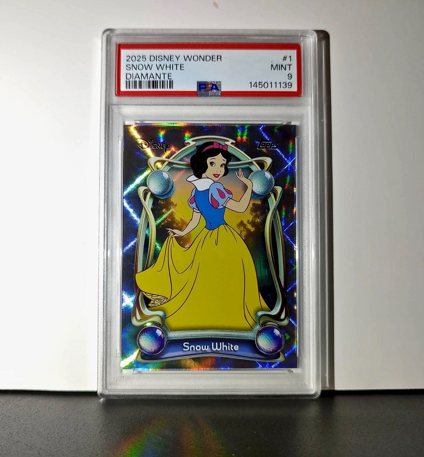 Snow White 2025 Topps Disney #1 Winter Snow White and the Seven Dwarfs PSA 9