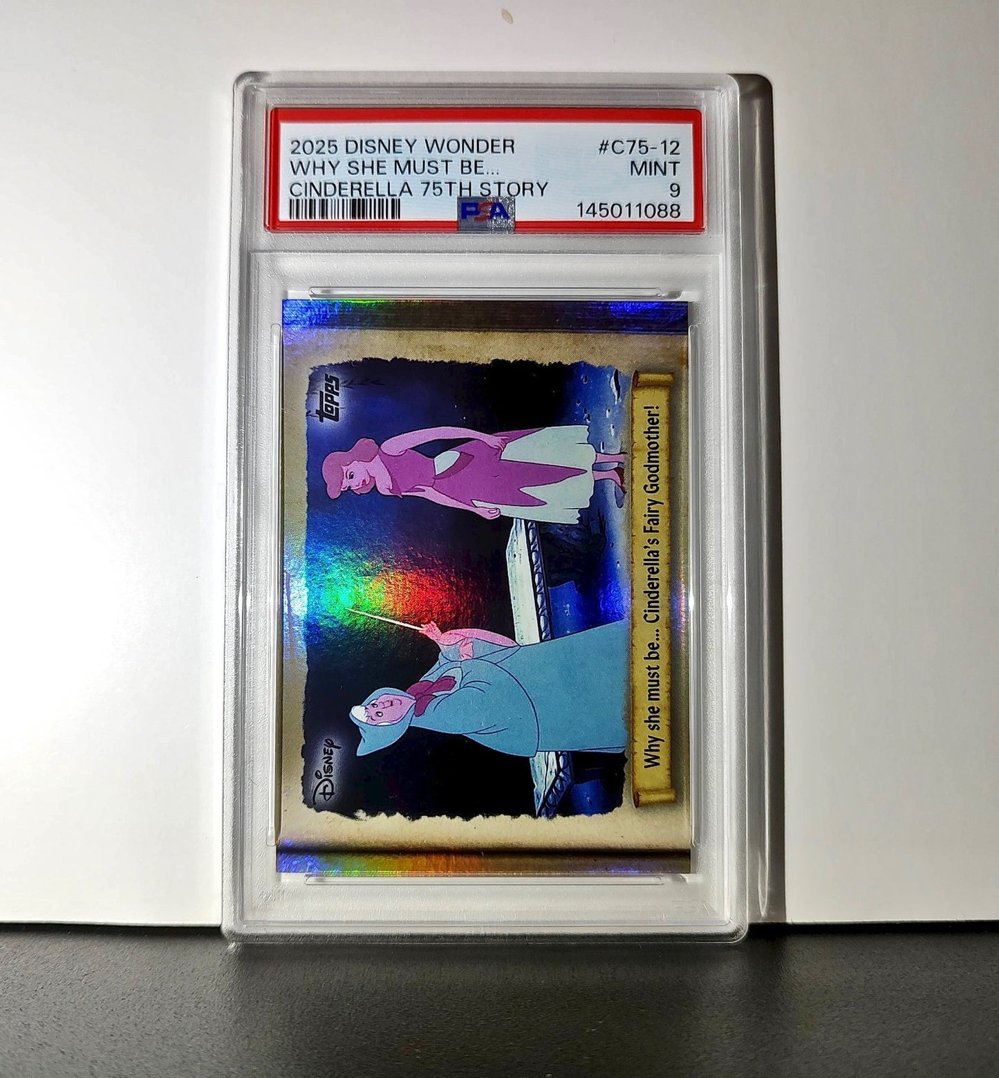 Why she must be… Cinderella's Fairy Godmother! 2025 Topps Disney #C75-12 PSA 9