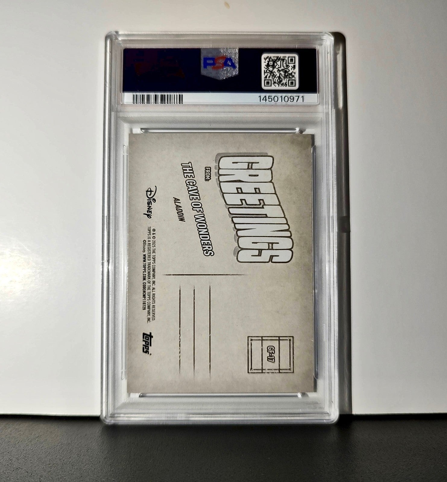 The Cave ofs 2025 Topps Disney #GF-17 Greetings From Card Aladdin PSA 10