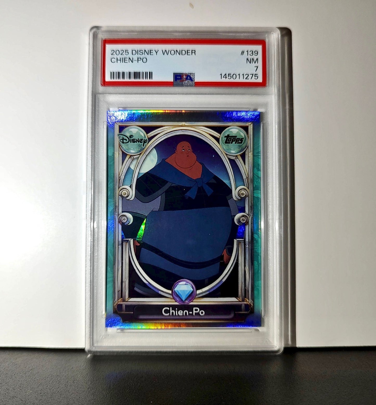 Chien-Po 2025 Topps Disney Wonder #139 Diamond Card Mulan PSA 7