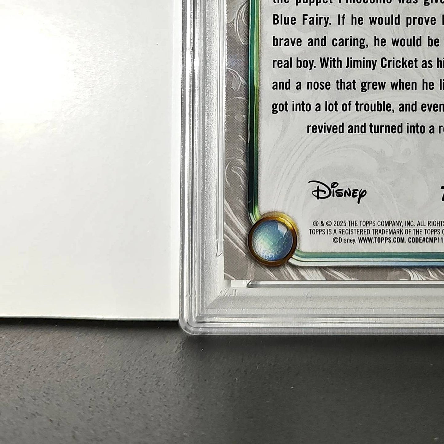 Pinocchio 2025 Topps Disney Wonder #7 Winter Variant Card Pinocchio PSA 8