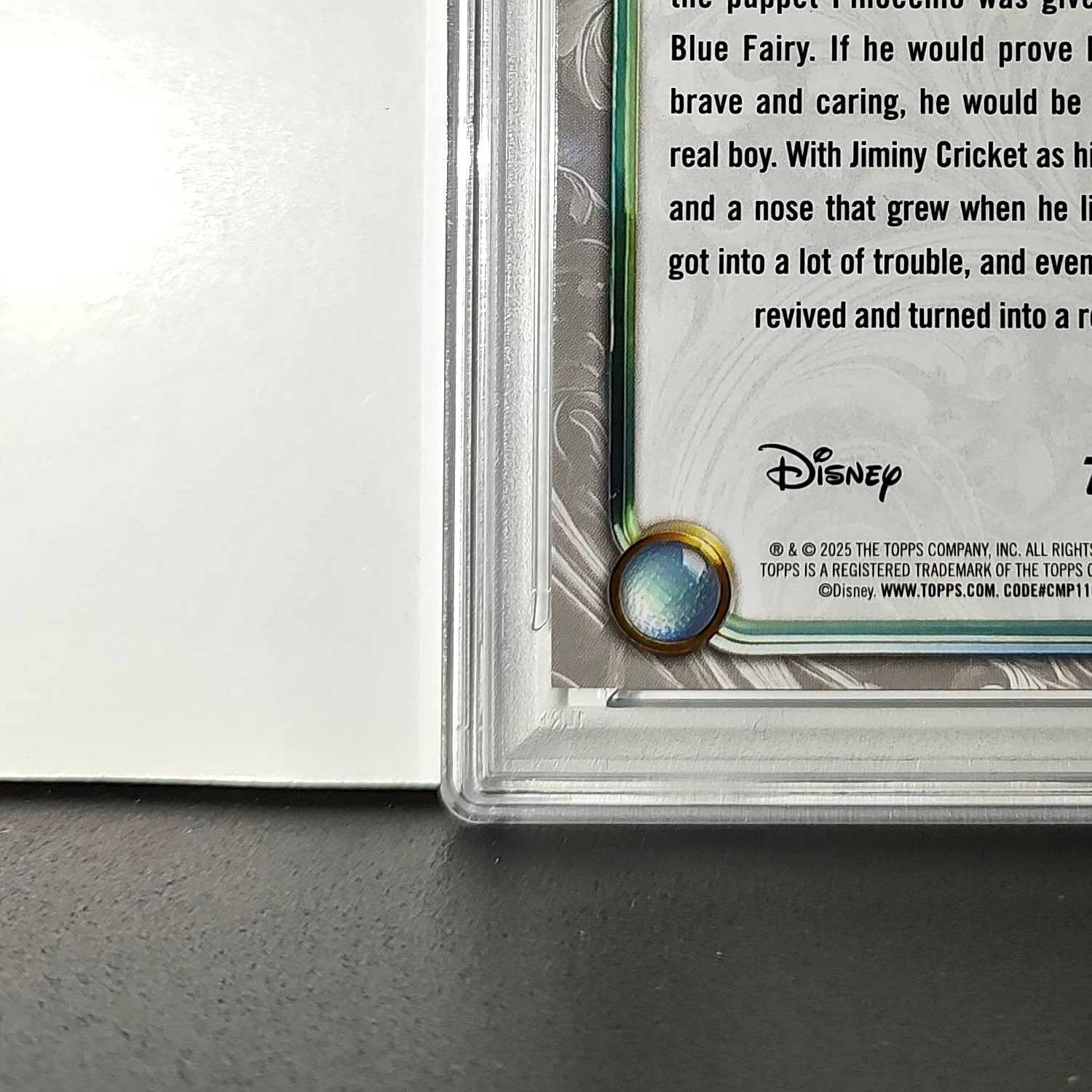 Pinocchio 2025 Topps Disney Wonder #7 Winter Variant Card Pinocchio PSA 8