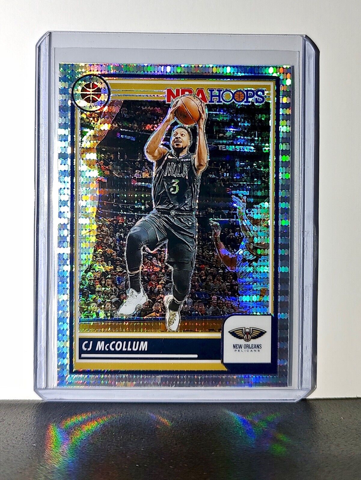 CJ McCollum 2023-24 Panini Premium NBA Hoops #172 Pulsar Prizm Pelicans