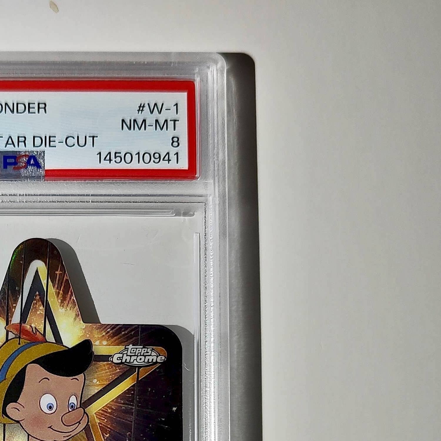 Pinocchio 2025 Topps Chrome Disney #W-1 Wish Upon A Star Die Cut Pinocchio PSA 8
