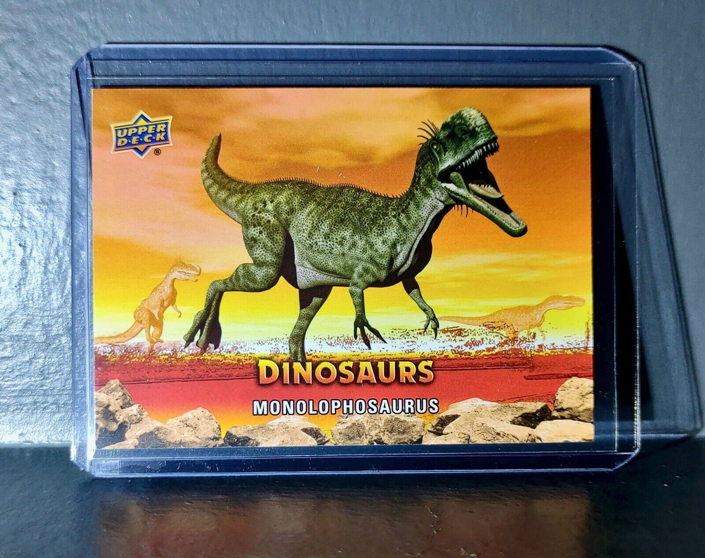 2015 Upper Deck Dinosaurs Monolophosaurus Extinction Red Parallel #65 Card