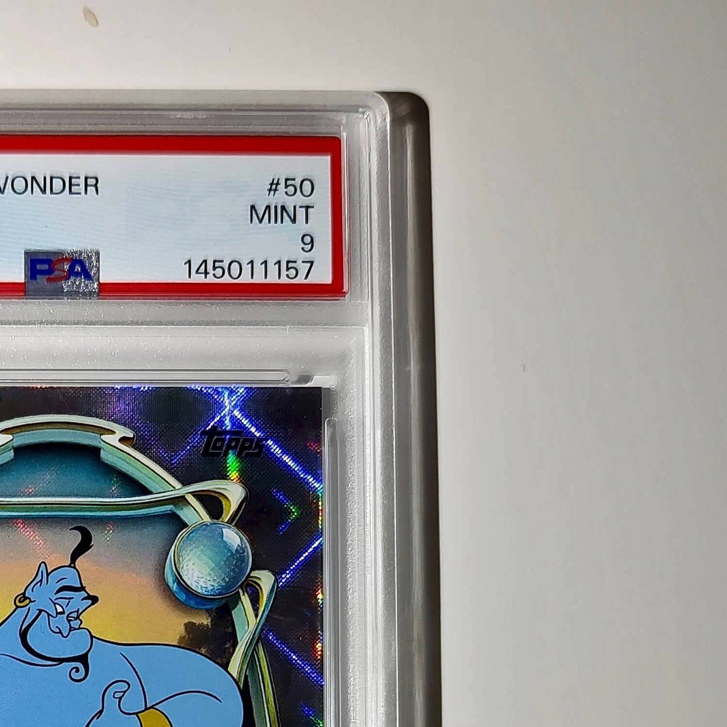 Genie 2025 Topps Disney Wonder #50 Winter Variant Card Aladdin PSA 9