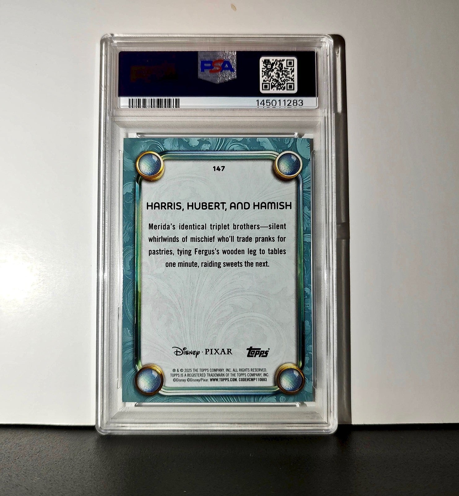 Harris, Hubert, and Hamish 2025 Topps Disney #147 Diamond Card Brave PSA 8