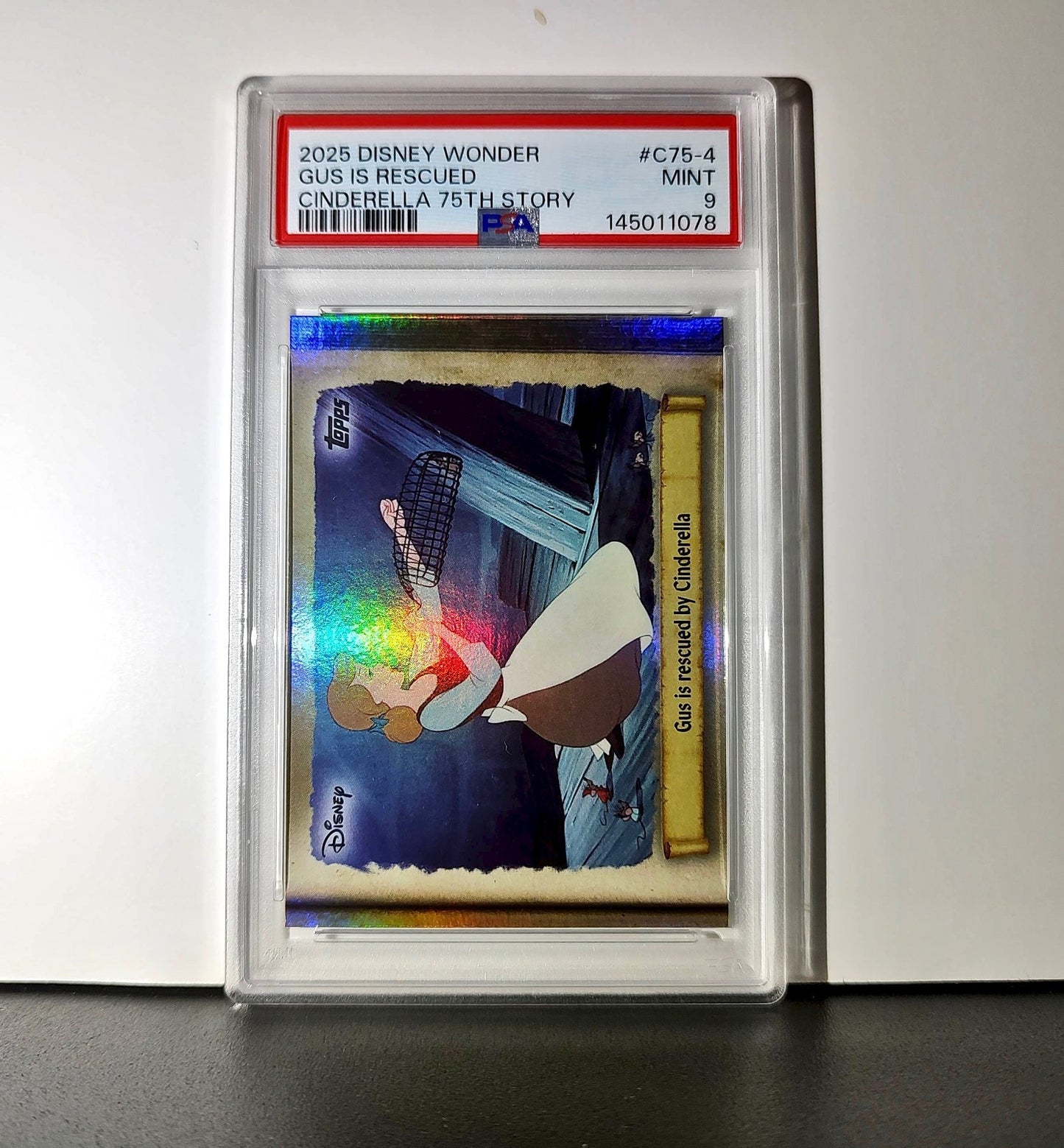 Gus is rescued by Cinderella 2025 Topps Disney #C75-4 Cinderella PSA 9