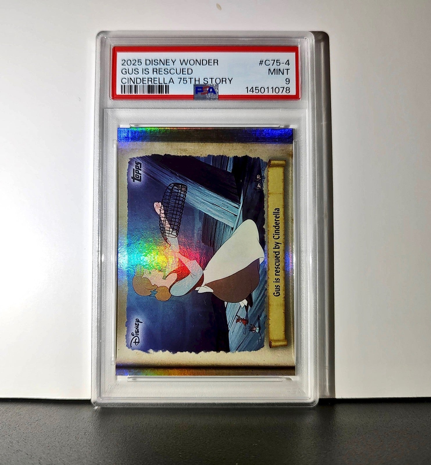 Gus is rescued by Cinderella 2025 Topps Disney #C75-4 Cinderella PSA 9