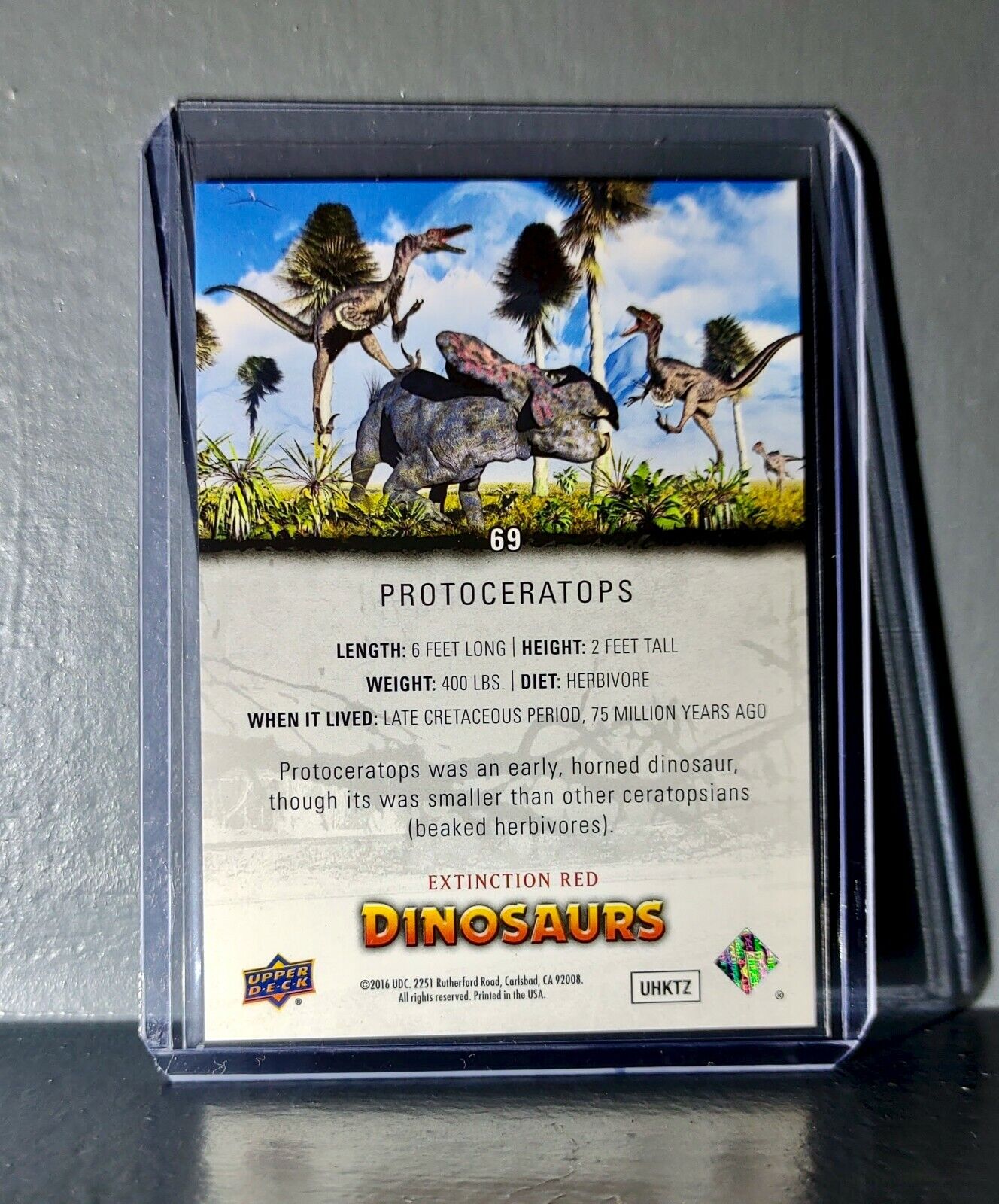 2015 Upper Deck Dinosaurs Protoceratops Extinction Red Parallel #69 Card