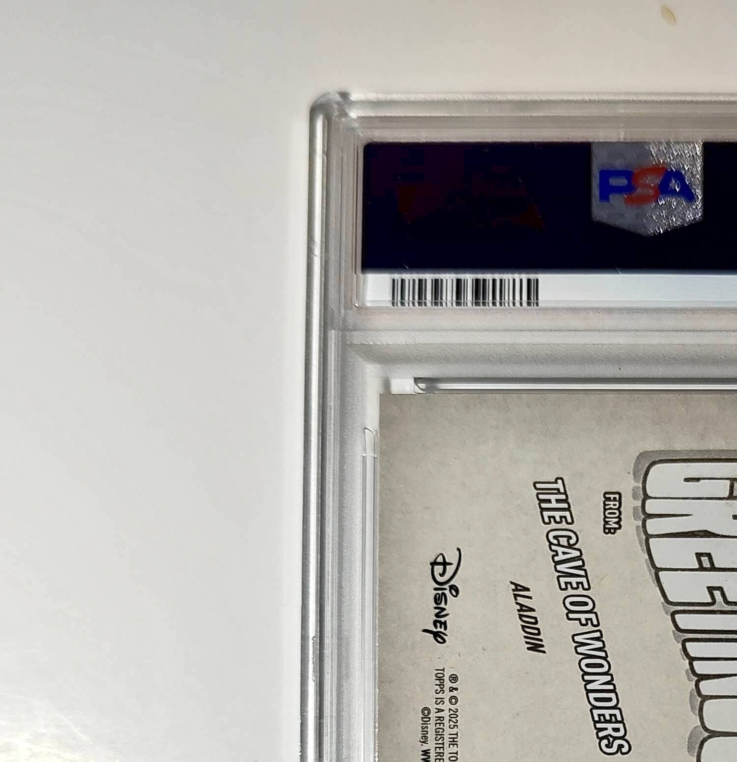 The Cave ofs 2025 Topps Disney #GF-17 Greetings From Card Aladdin PSA 10