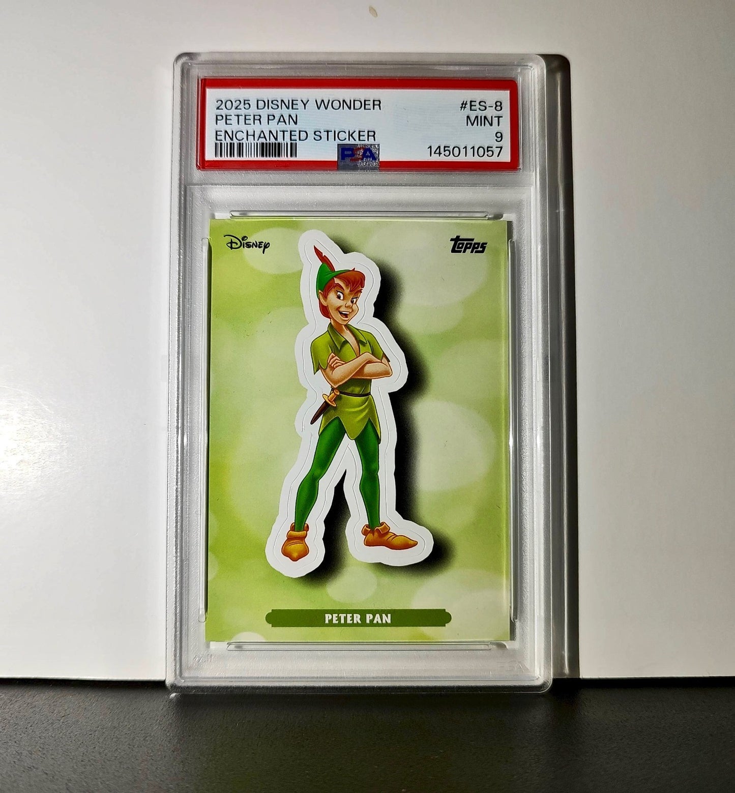Peter Pan 2025 Topps Disney #ES-8 Enchanted Sticker Card Peter Pan PSA 9