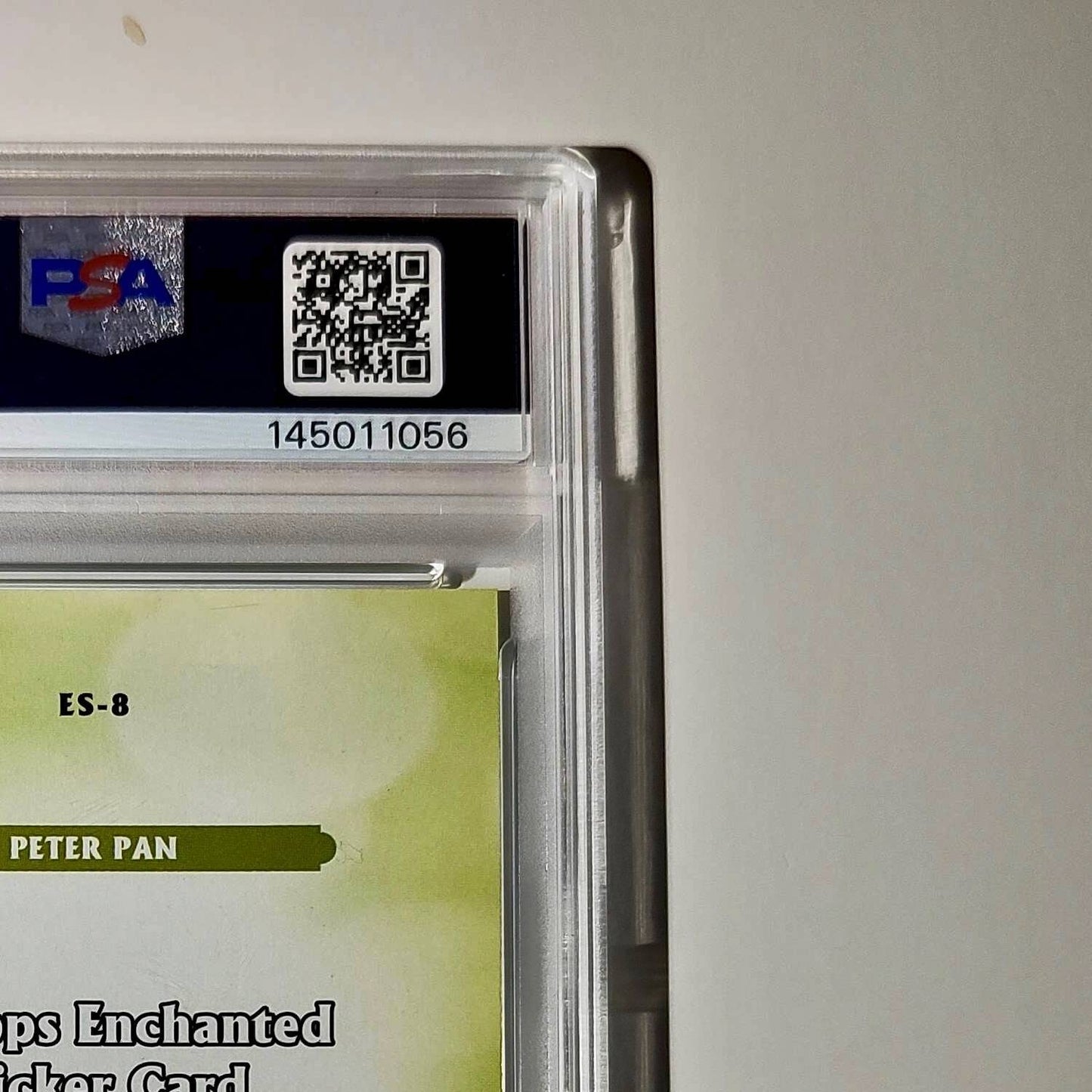 Peter Pan 2025 Topps Disney #ES-8 Enchanted Sticker Card Peter Pan PSA 8