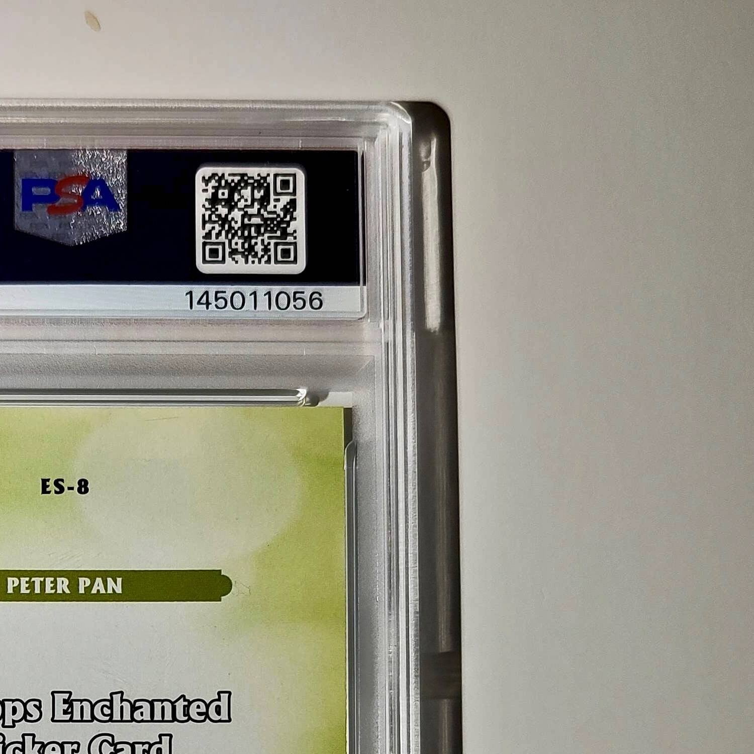 Peter Pan 2025 Topps Disney #ES-8 Enchanted Sticker Card Peter Pan PSA 8