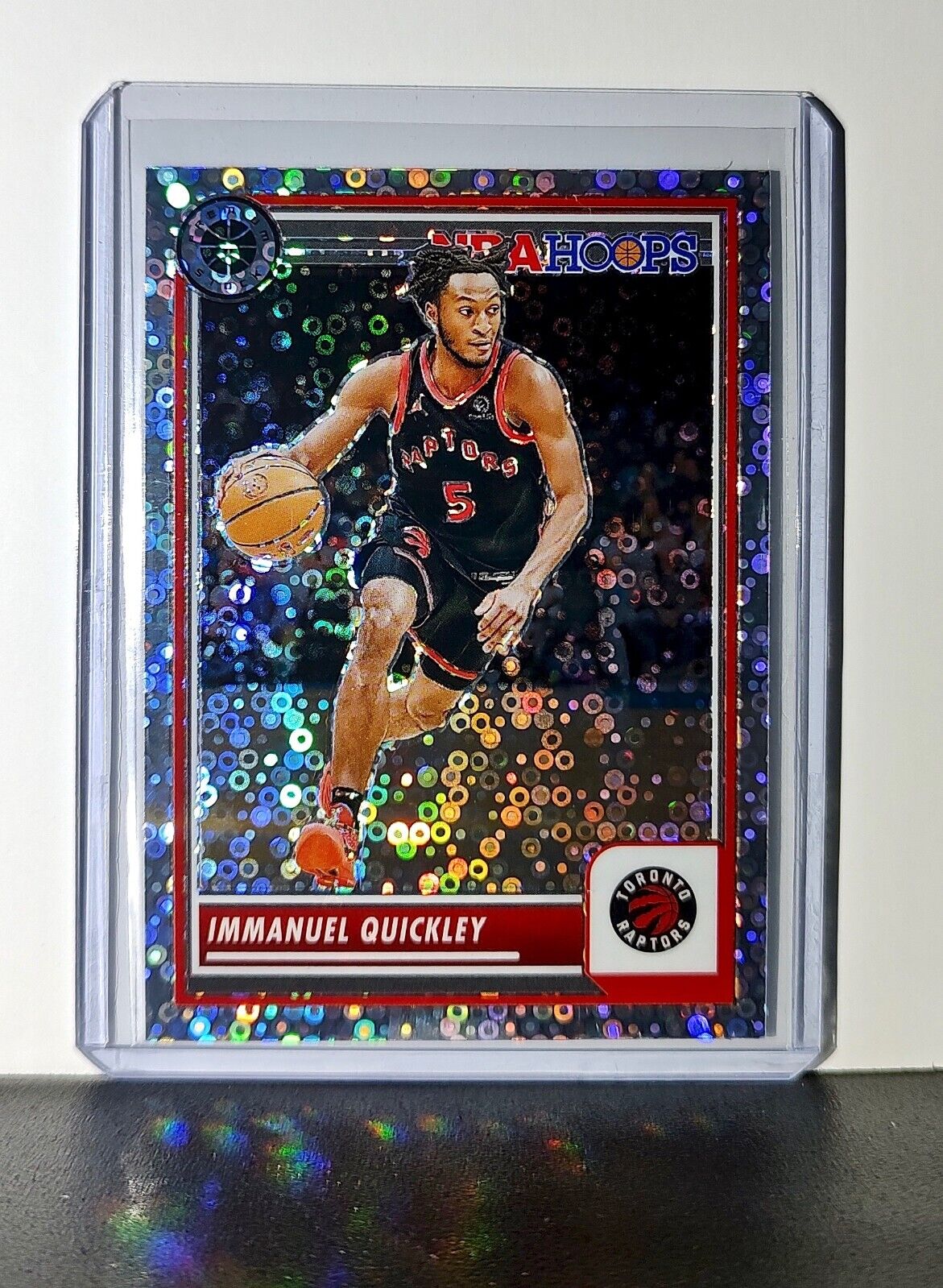 Immanuel Quickley 2023-24 Panini Premium NBA Hoops #105 Disco Prizm Card Raptors