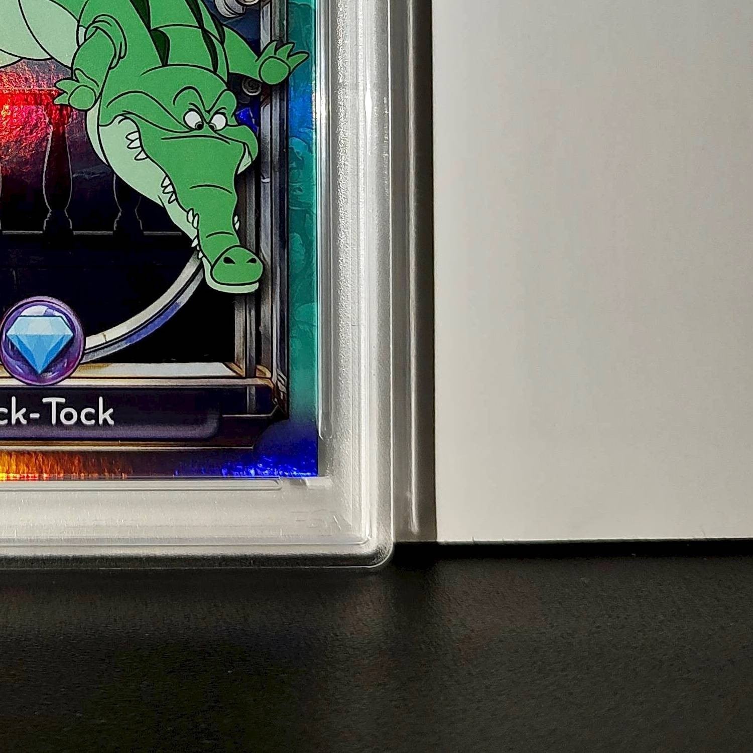 Tick-Tock 2025 Topps Disney Wonder #119 Diamond Card Peter Pan PSA 9
