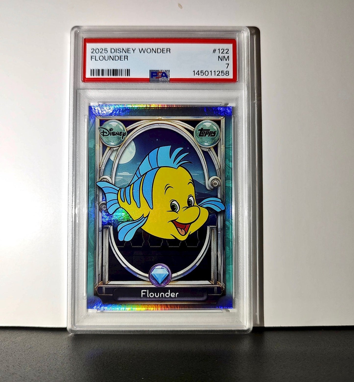 Flounder 2025 Topps Disney Wonder #122 Diamond Card The Little Mermaid PSA 7