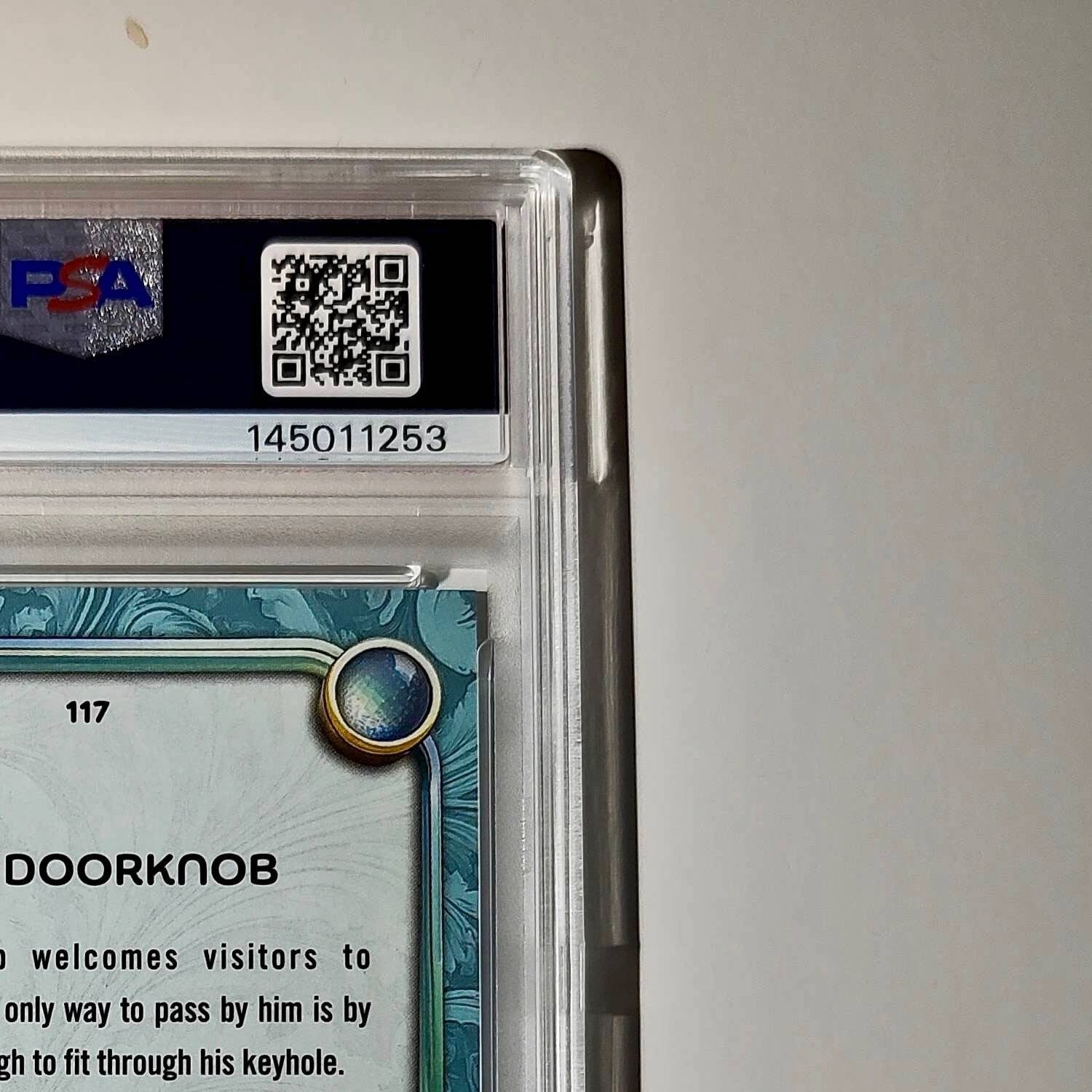 The Doorknob 2025 Topps Disney #117 Diamond Card Alice in Wonderland PSA 9