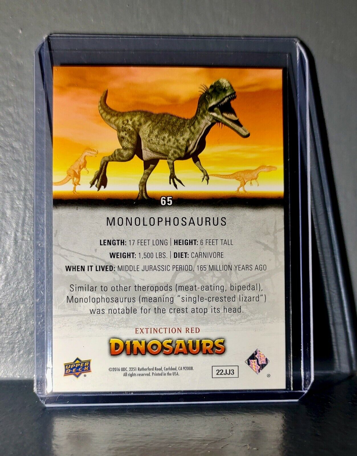 2015 Upper Deck Dinosaurs Monolophosaurus Extinction Red Parallel #65 Card