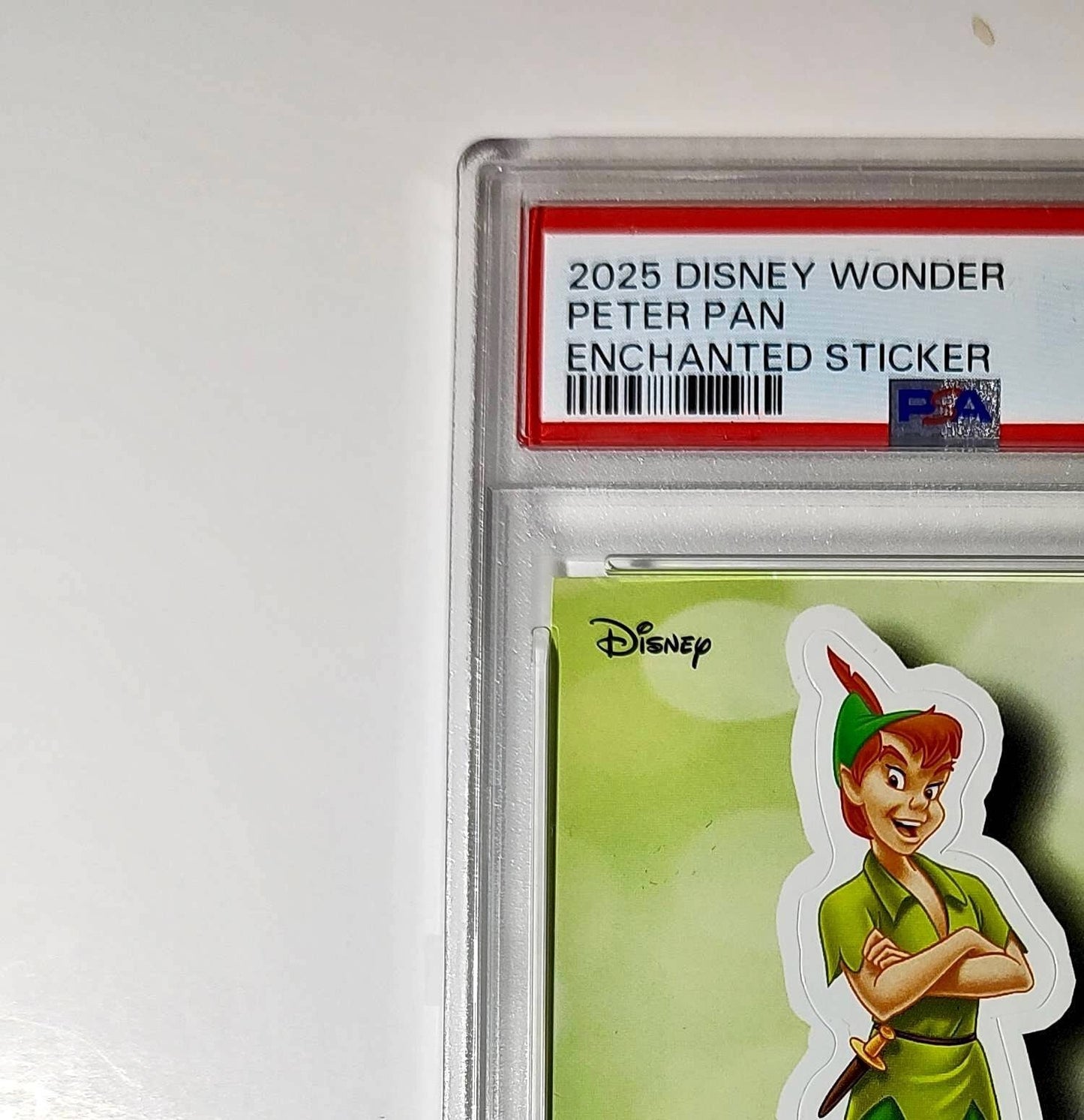 Peter Pan 2025 Topps Disney #ES-8 Enchanted Sticker Card Peter Pan PSA 9